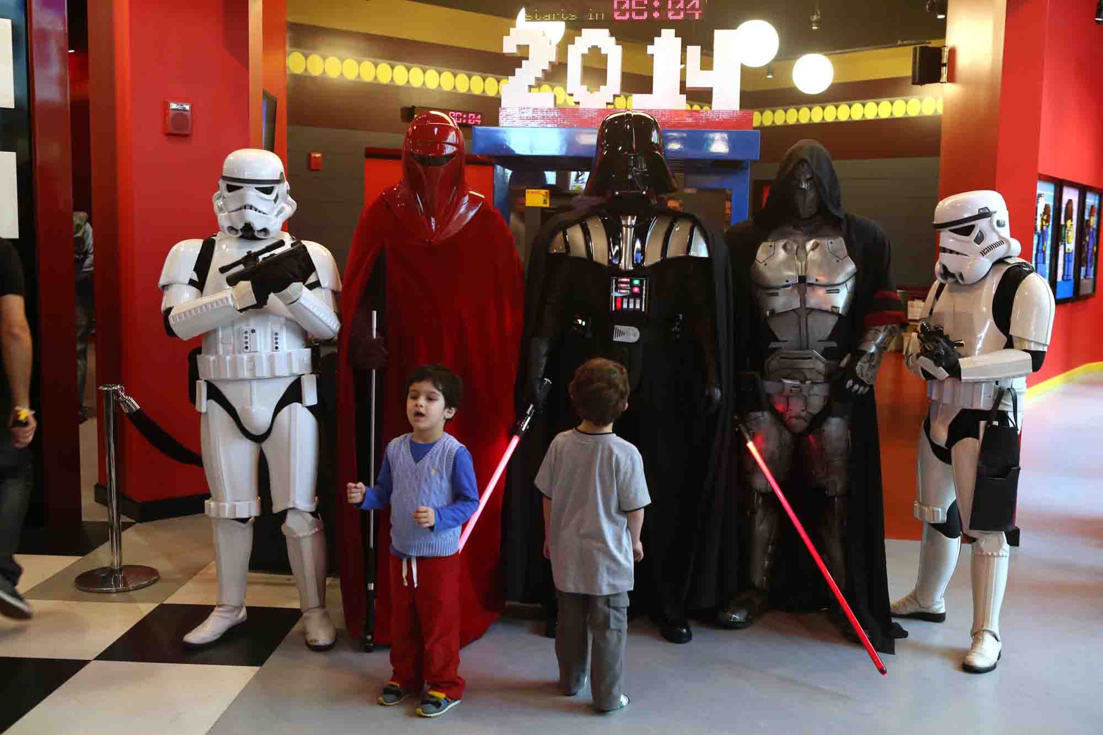 Kids checking out Star Wars characters at Star Wars Day at LEGOLAND Discovery Center in Phipps Plaza on Saturday, Jan. 11, 2014.