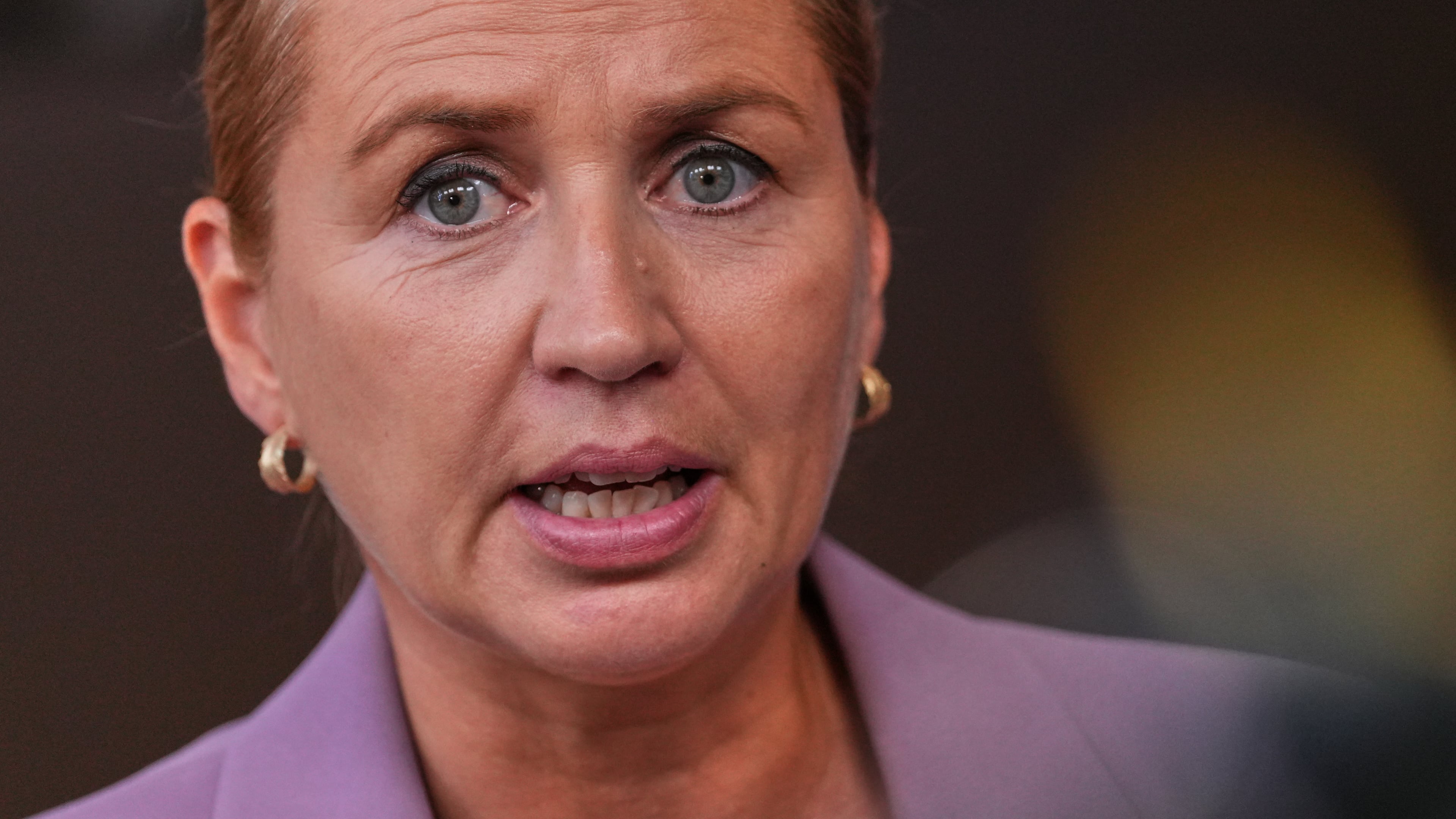 FILE - Denmark's Prime Minister Mette Frederiksen talks to journalists as she arrives for the EU summit in Brussels, Thursday, June 18, 2026. (AP Photo/Marius Burgelman, File)
