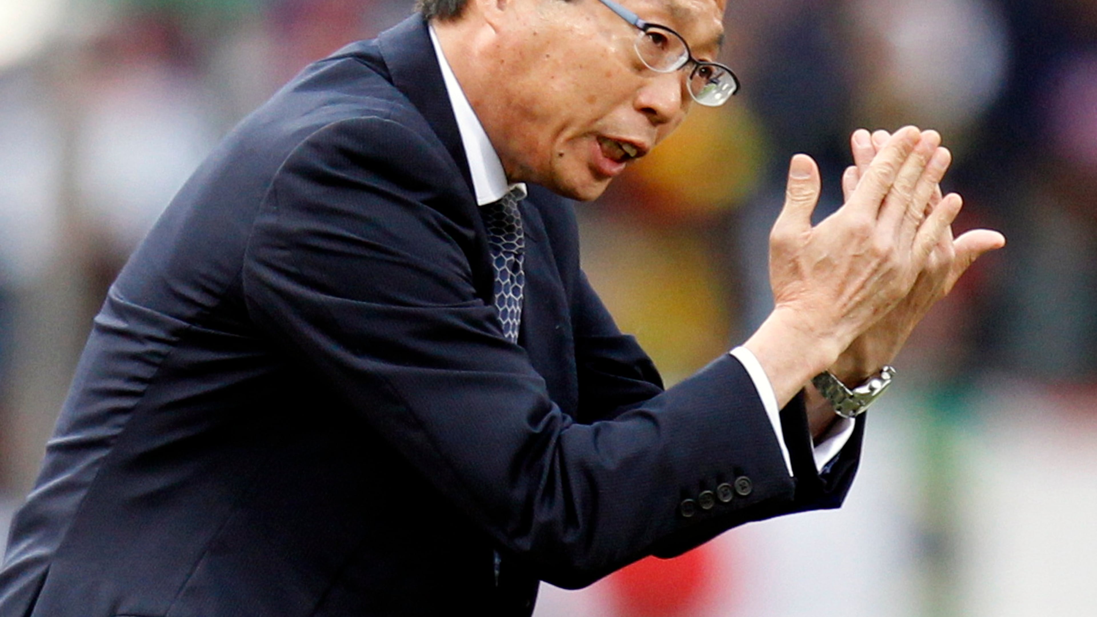 FILE - Japan head coach Takeshi Okada gestures during the World Cup round of 16 soccer match between Paraguay and Japan at the Loftus Versfeld Stadium in Pretoria, South Africa, Tuesday, June 29, 2010. (AP Photo/Luca Bruno, File)