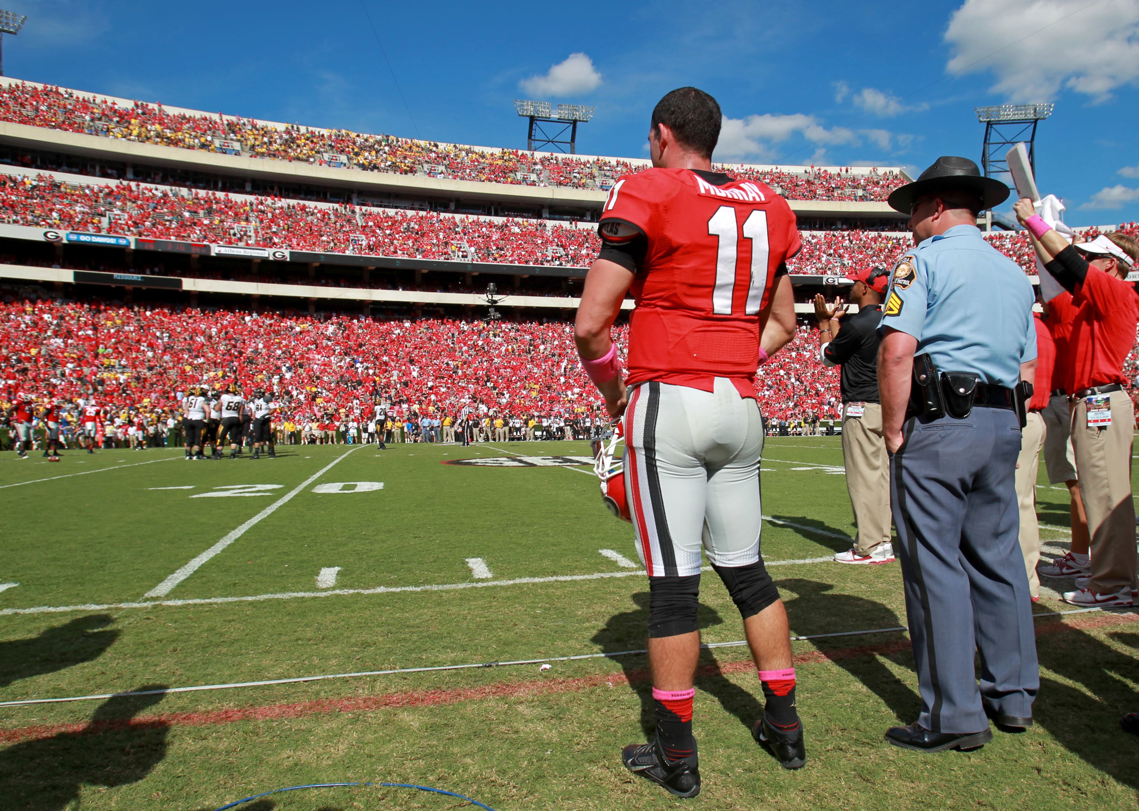 Georgia Bulldogs quarterback Aaron Murray (11) watches the Georgia defense from the sideline late in their game at Sanford Stadium Saturday afternoon in Athens, Ga., October 12, 2013. Missouri defeated Georgia 41-26. Murray threw for 290 yards, 3 touchdowns, 2 interceptions and had a fumble returned for a touchdown in the loss. JASON GETZ / JGETZ@AJC.COM