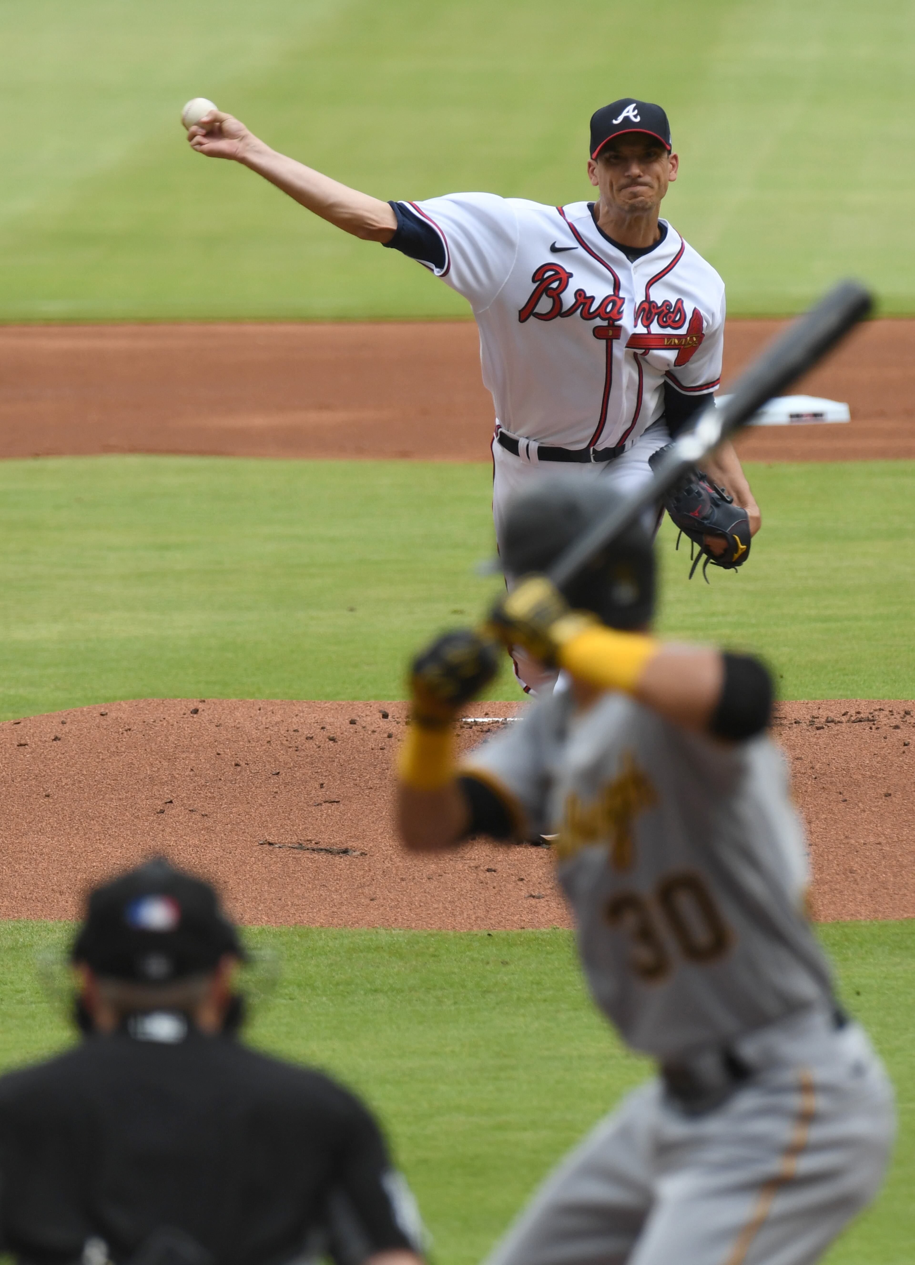 June 11, 2022 Atlanta - Atlanta Braves' starting pitcher Charlie Morton (50) delivers a pitch against Pittsburgh Pirates in the first inning at Truist Park on Saturday, June 11, 2022. (Hyosub Shin / Hyosub.Shin@ajc.com)