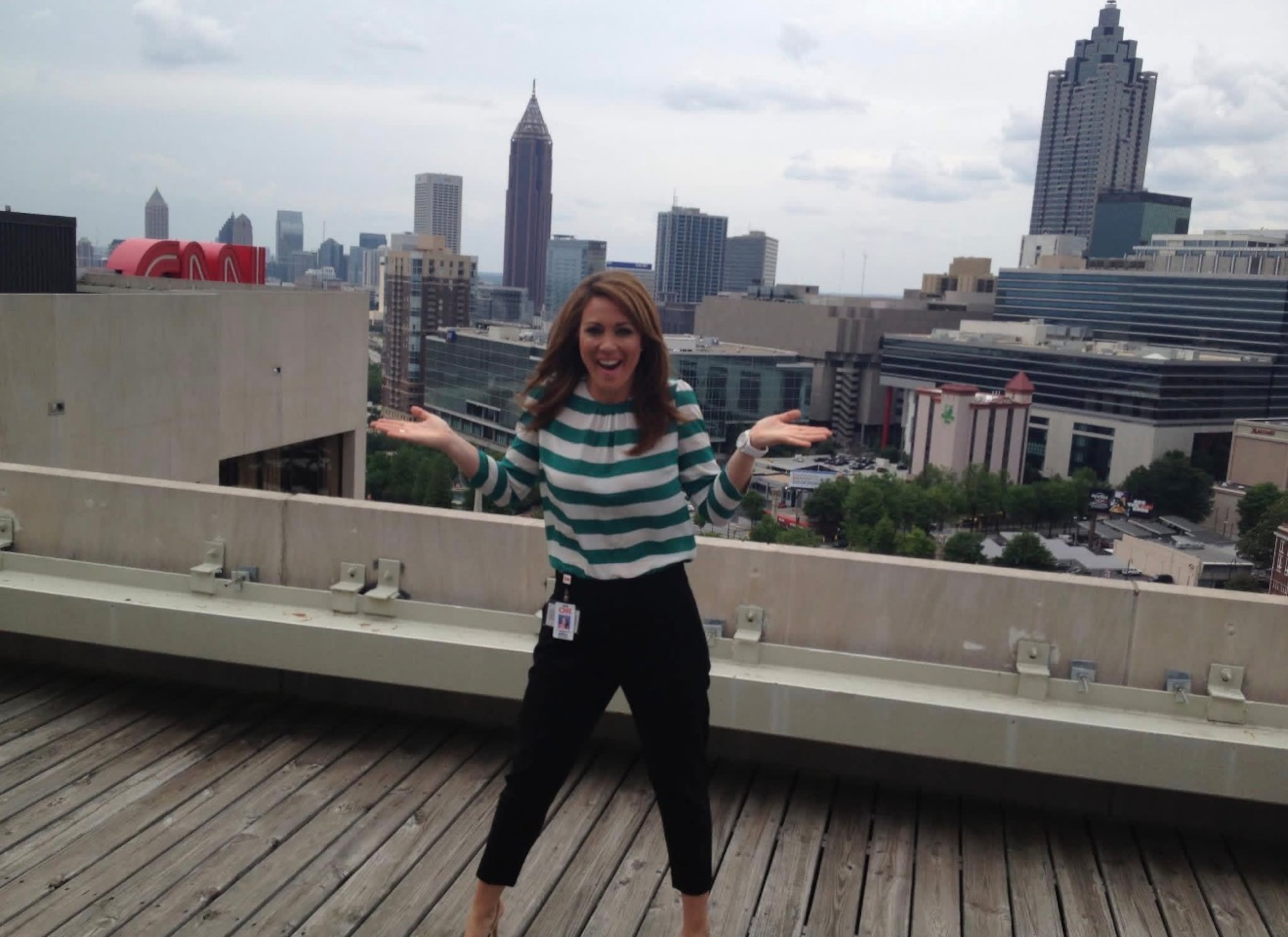 Former CNN anchor Brooke Baldwin snuck onto the roof of CNN Center in 2012 to take a peek at Ted Turner's apartment, but not without setting off silent arms and being confronted by building security. Baldwin said she was surprised she found the photo, as it was taken on her BlackBerry. (Courtesy of Brooke Baldwin)