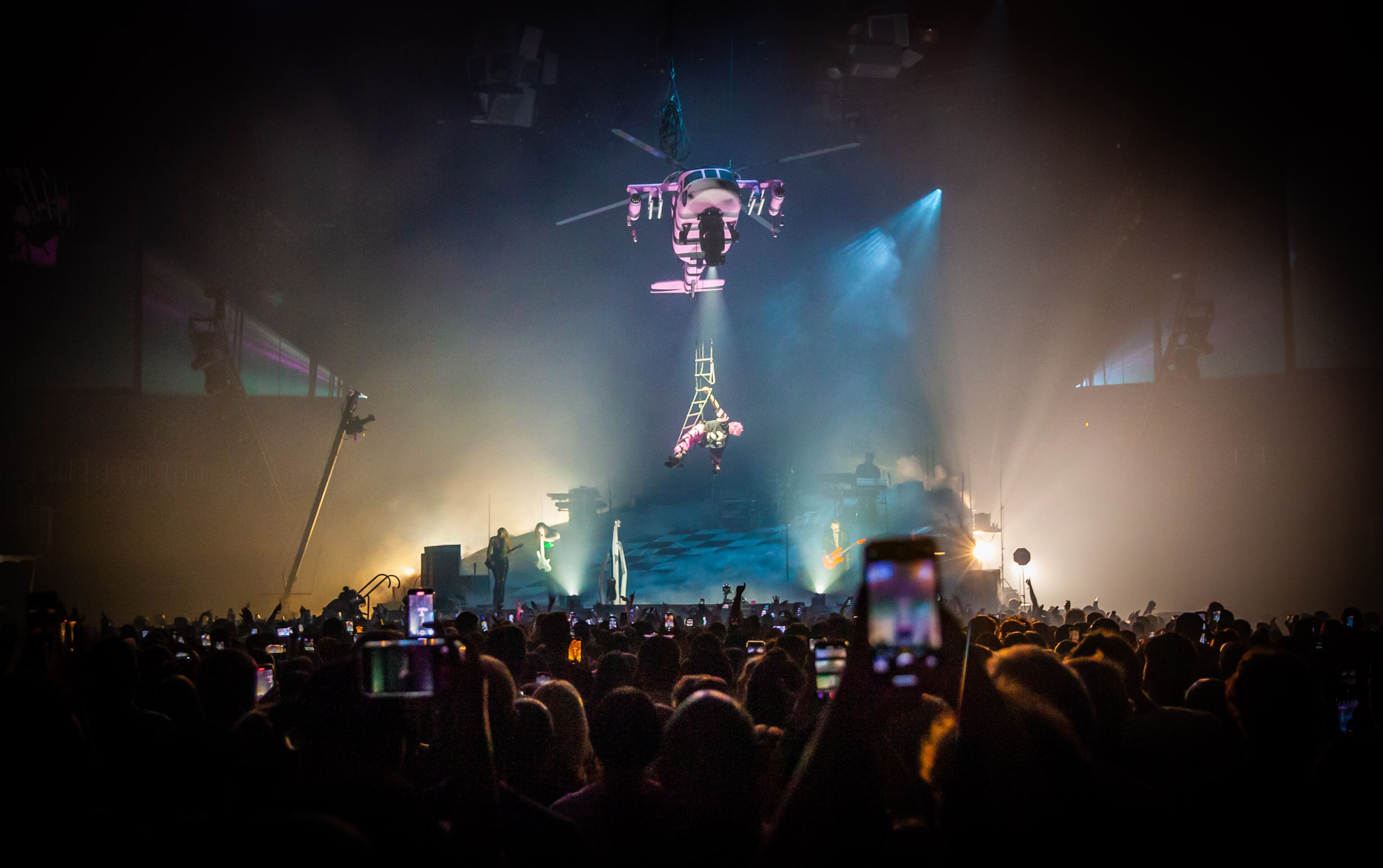 Machine Gun Kelly performs above the crowd for his Mainstream Sellout tour to State Farm Arena in Atlanta on Friday, June 17, 2022. (Photo: Ryan Fleisher for The Atlanta Journal-Constitution)