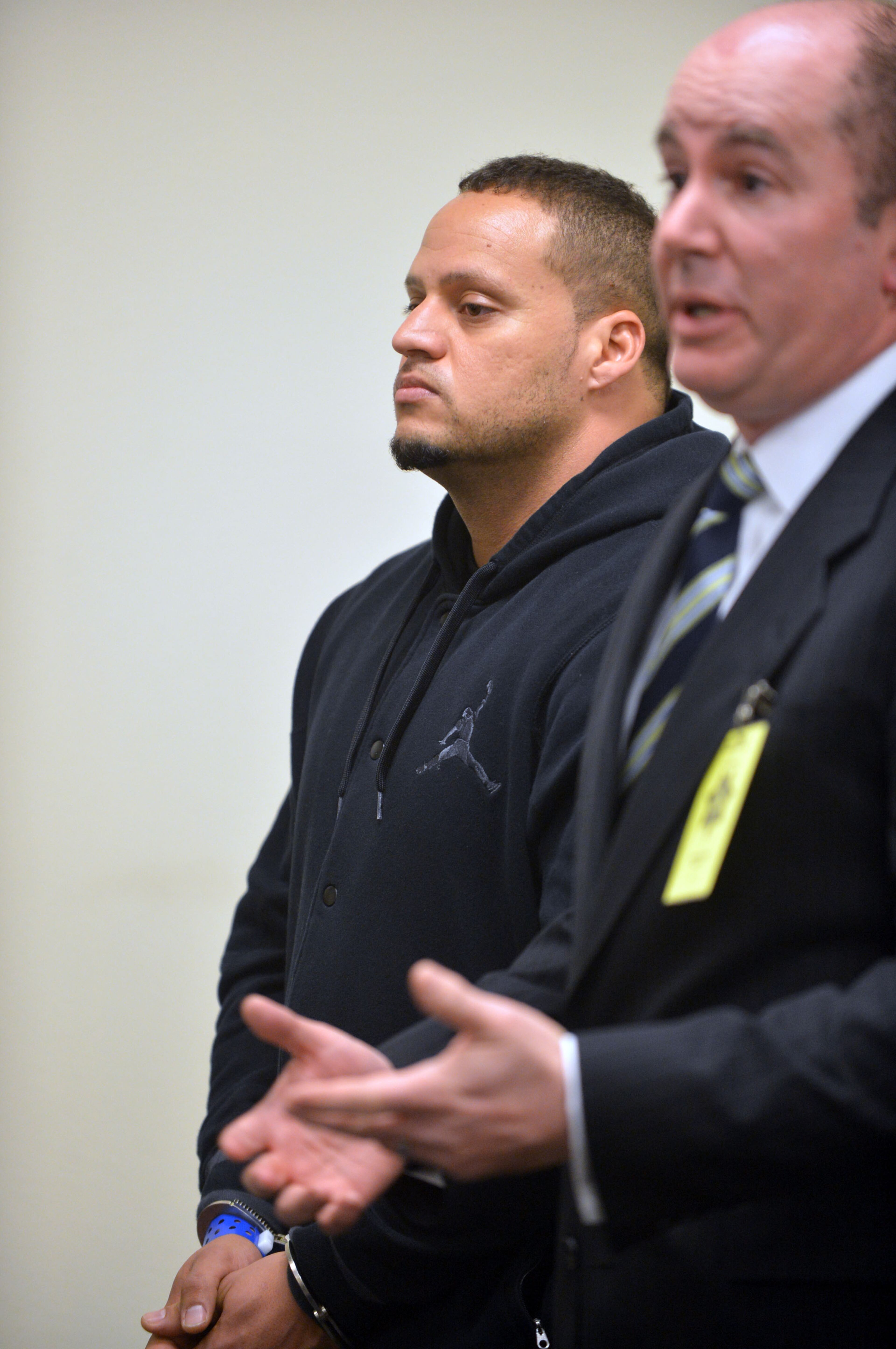Justin Bieber's bodyguard, Hugo Hesny (left), appears in Fulton County Magistrate Court with his lawyer, Andrew Schwartz, for a first appearance Wednesday, February 26, 2014. He was charged with a Felony, entering auto with intent for theft. Judge Jessy Lall granted him $15,000 bond and ordered him to appear in Superior Court, March 12. KENT D. JOHNSON / KDJOHNSON@AJC.COM