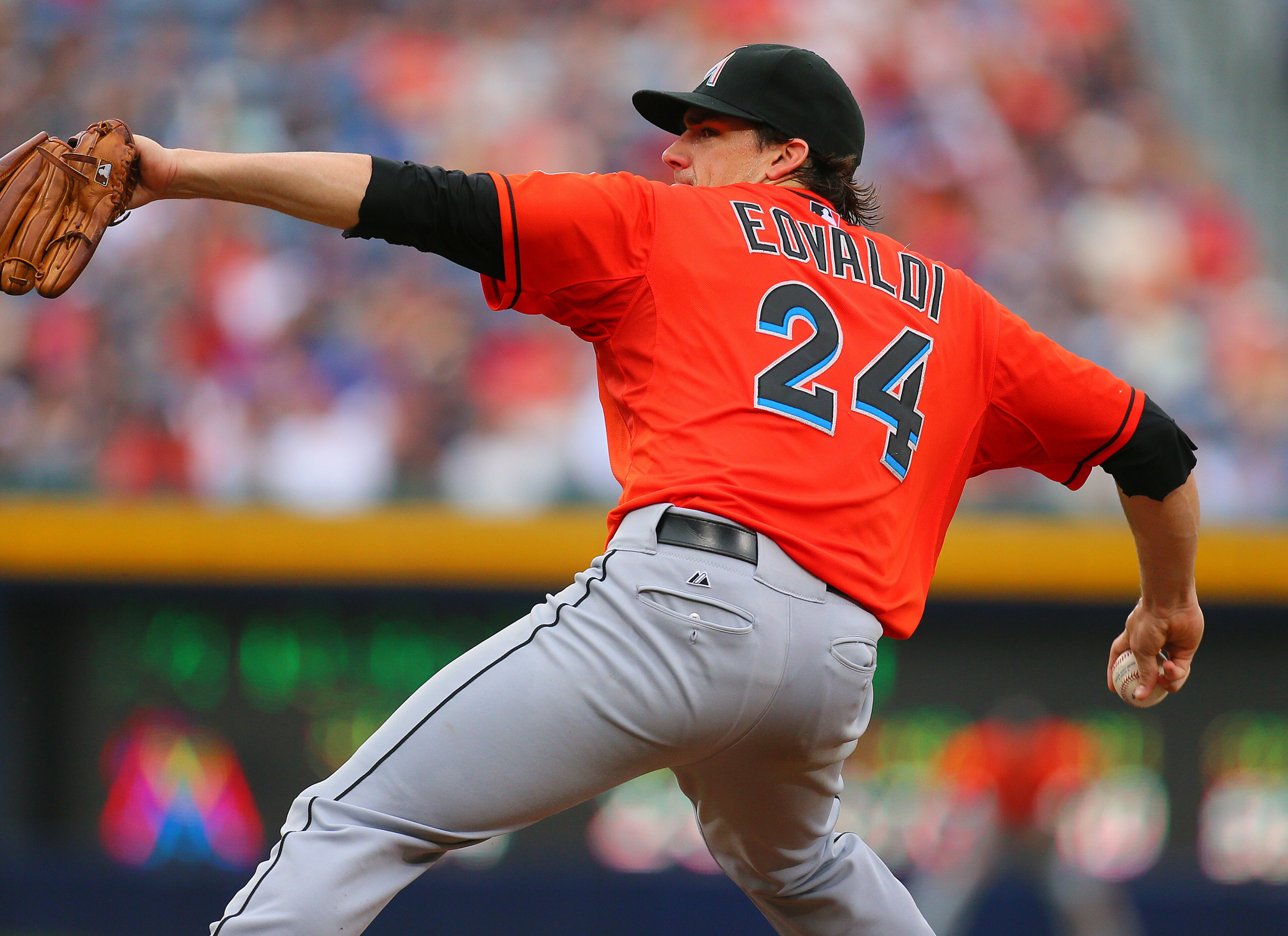 Marlins Nathan Eovaldi delivers a pitch against the Braves during the first inning in their MLB baseball game on Sunday, Sept. 1, 2013, in Atlanta. CURTIS COMPTON / CCOMPTON@AJC.COM