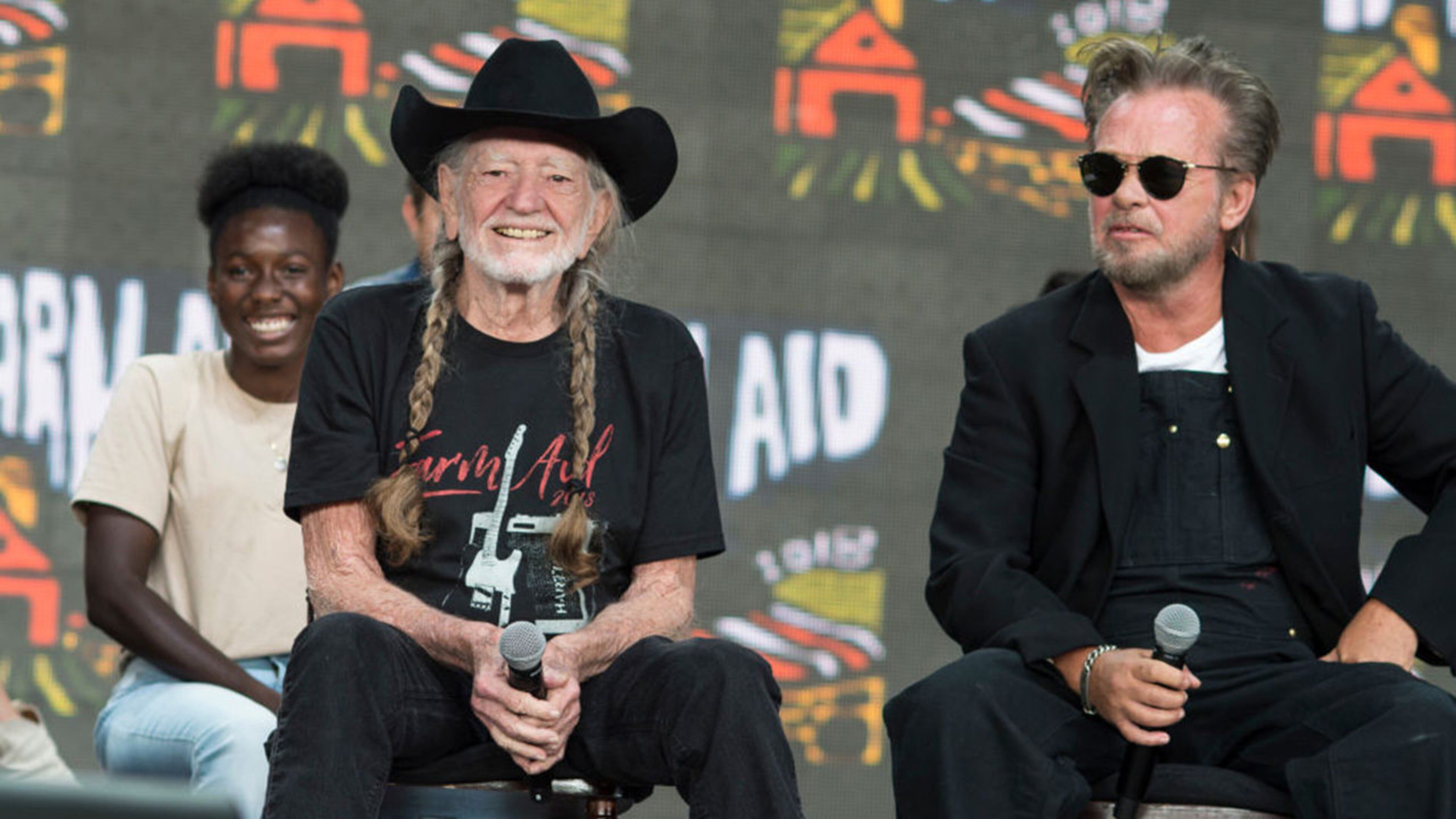 The Farm Aid press conference with Willie Nelson (L) and John Mellencamp (R) at the XFINITY Theatre in Hartford, Connecticut on September 22, 2018.