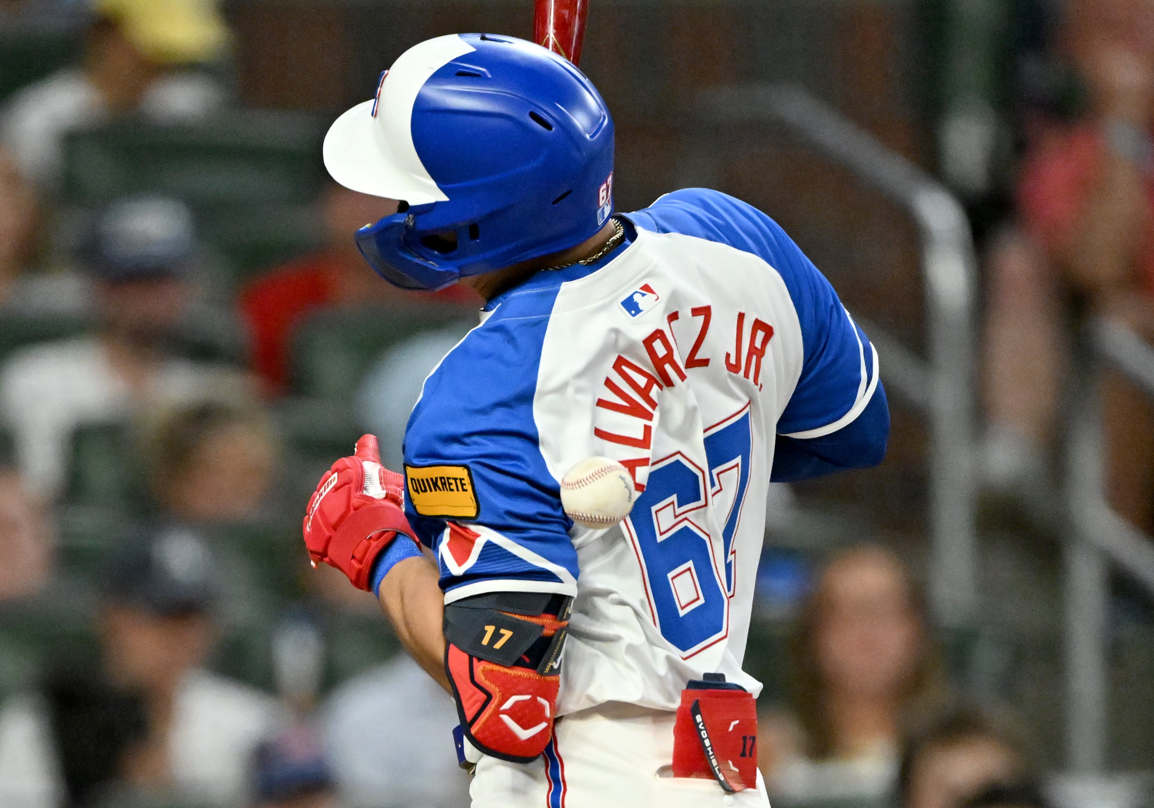 Atlanta Braves shortstop Nacho Alvarez Jr. (67) is hit by a pitch from New York Yankees pitcher Jonathan Loáisiga (43) during the seventh inning of a baseball game at Truist Park, Saturday, July 19, 2025, in Atlanta. New York Yankees won 12-9 over Atlanta Braves. (Hyosub Shin / AJC)