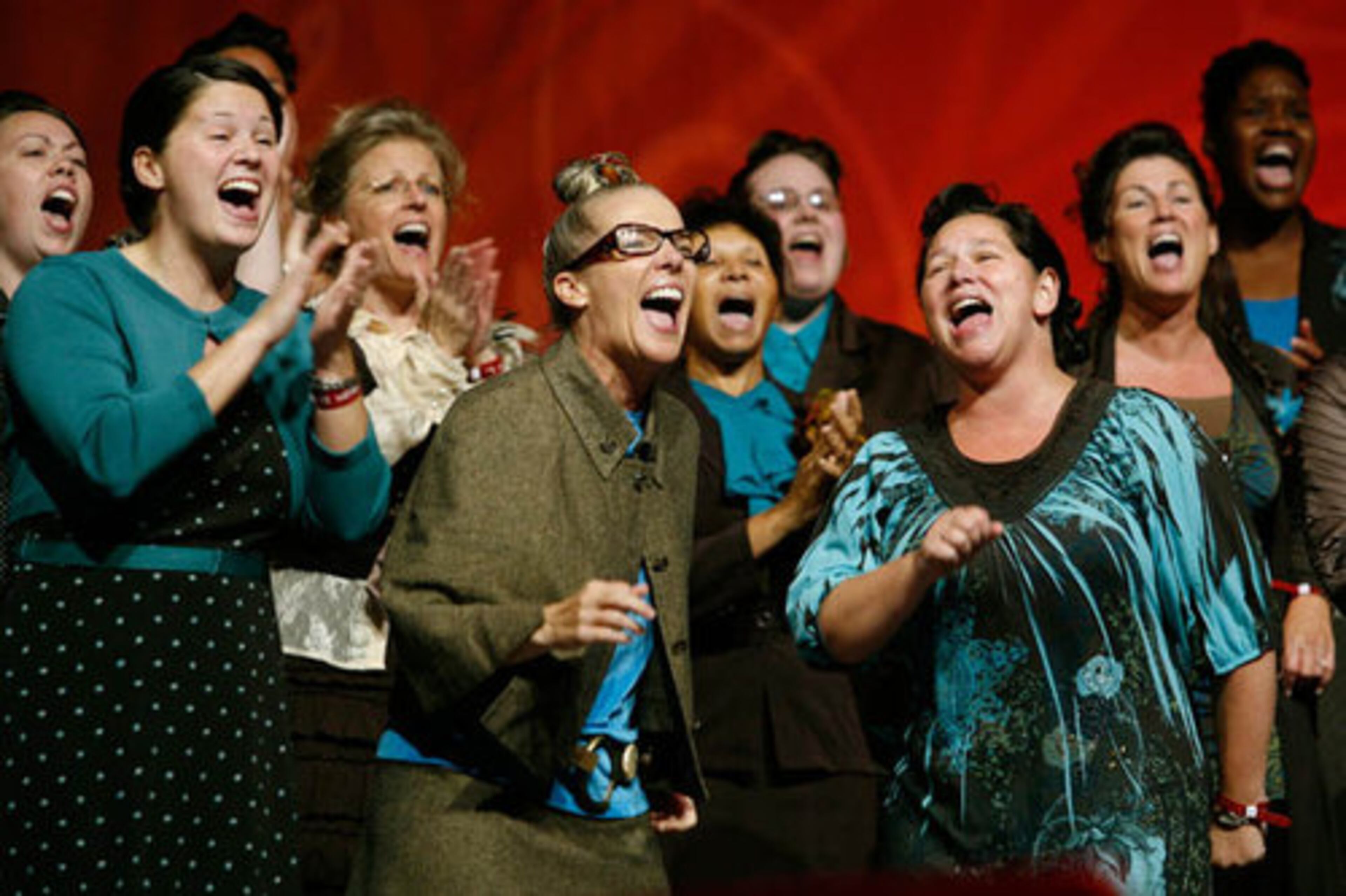Joy Norris, center, and the Atlanta West Pentecostal Church choir perform.
