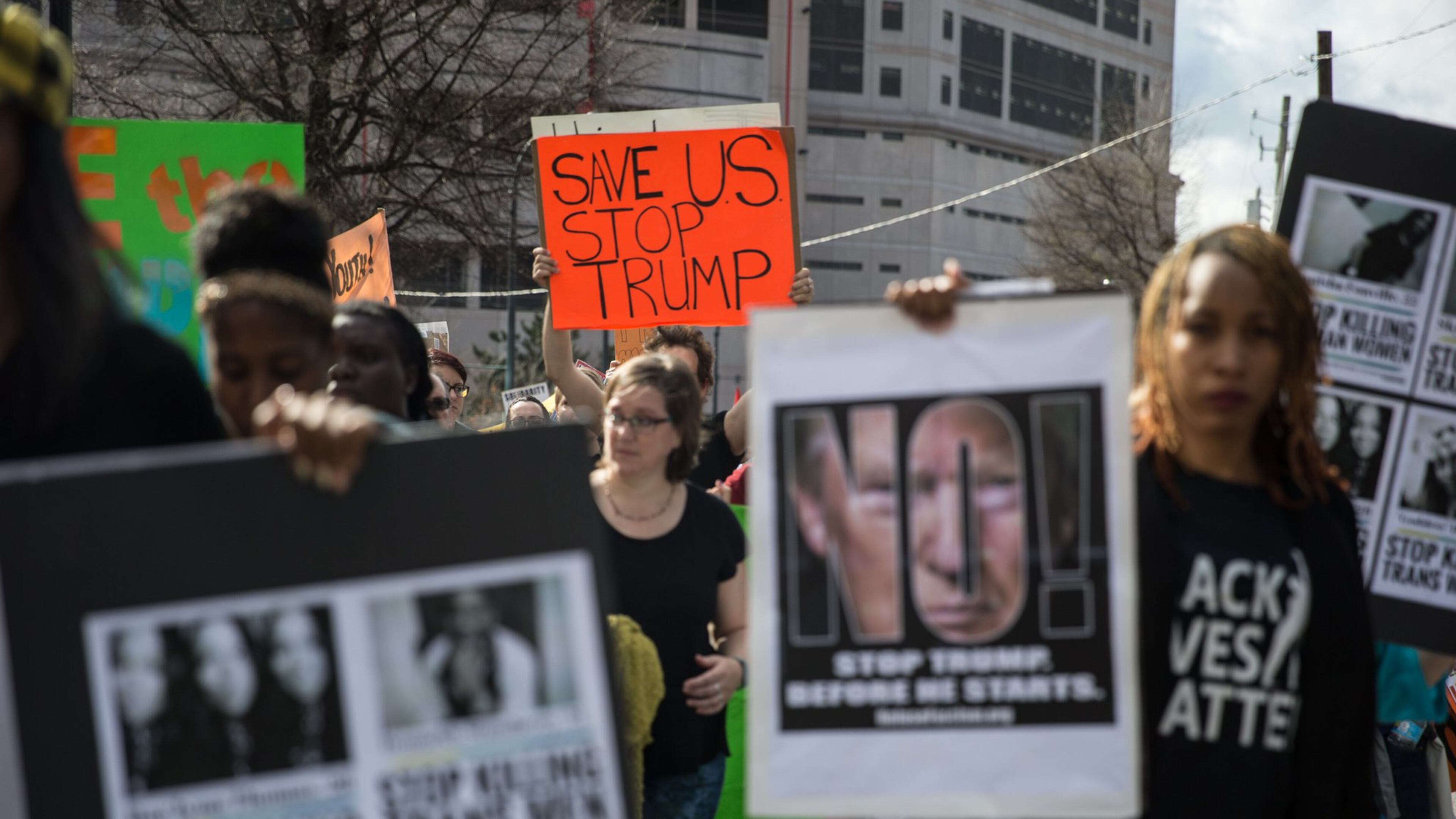 People march during a protest, Friday, Jan. 20, 2017, in Atlanta. BRANDEN CAMP/SPECIAL