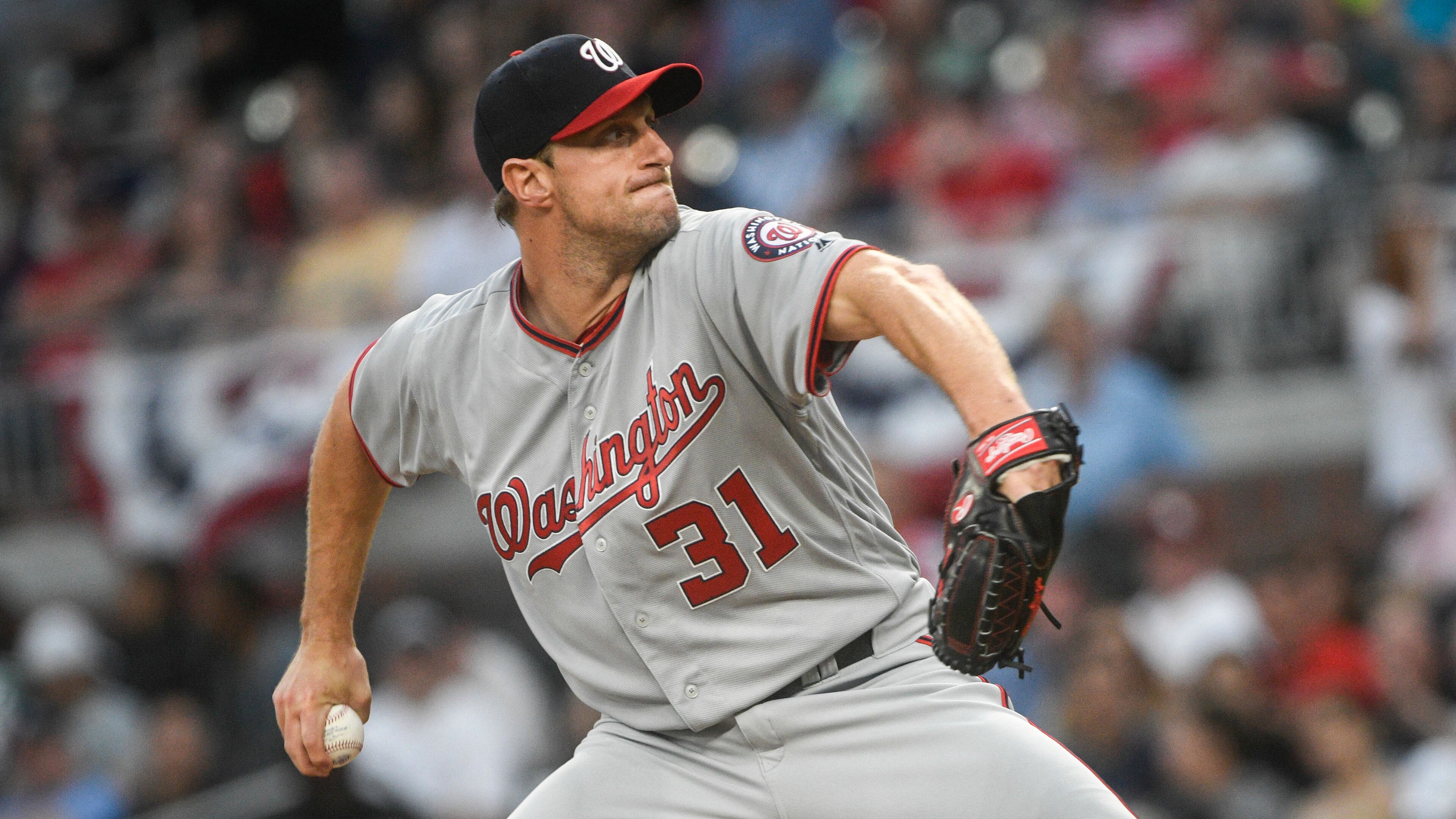 Max Scherzer pitches against the Atlanta Braves during the first inning of a baseball game, Tuesday, April 18, 2017.
