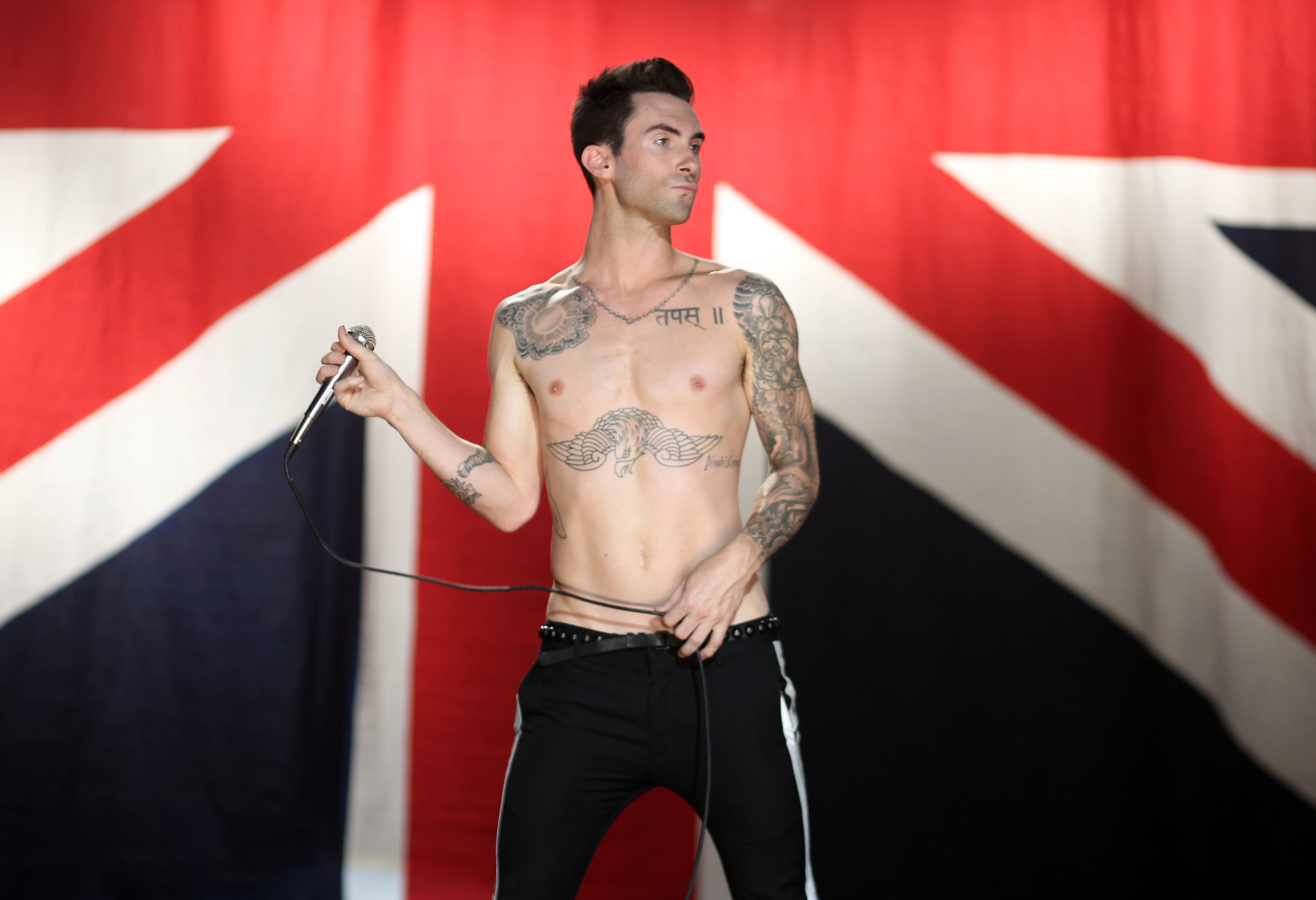 LOS ANGELES, CA - JULY 08: Musician Adam Levine of the band Maroon 5 performs at the Maroon 5 Video Shoot for "Moves Like Jagger" with Christina Aguilera on July 8, 2011 in Los Angeles, California. (Photo by Christopher Polk/Getty Images for A&M/Octone)