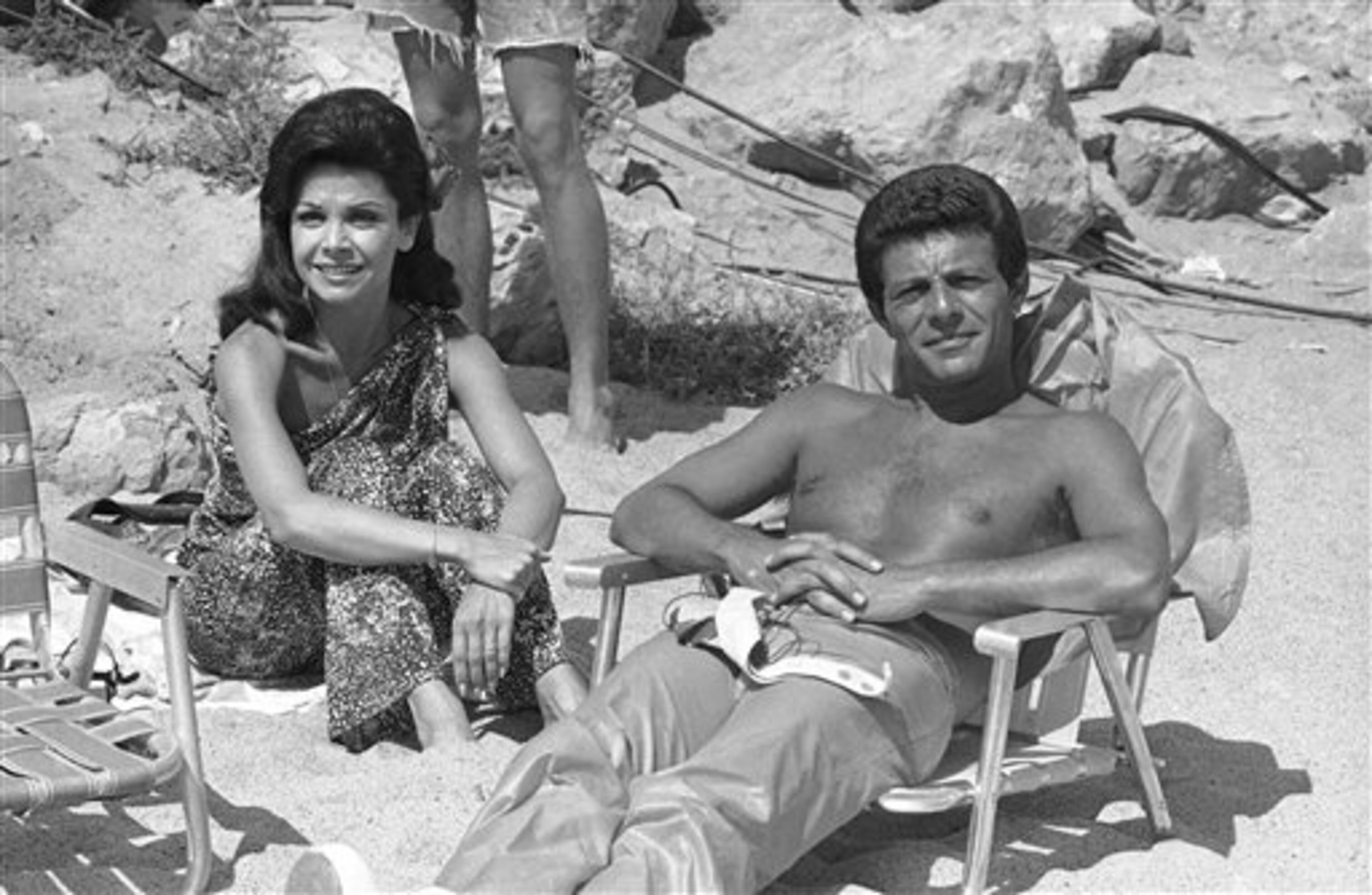 Working together again after a separation of ten years Frankie Avalon and Annette Funicello chat during a break in the filming of another beach movie in Los Angeles, Aug. 26, 1977. (AP Photo/Jeff Robbins)