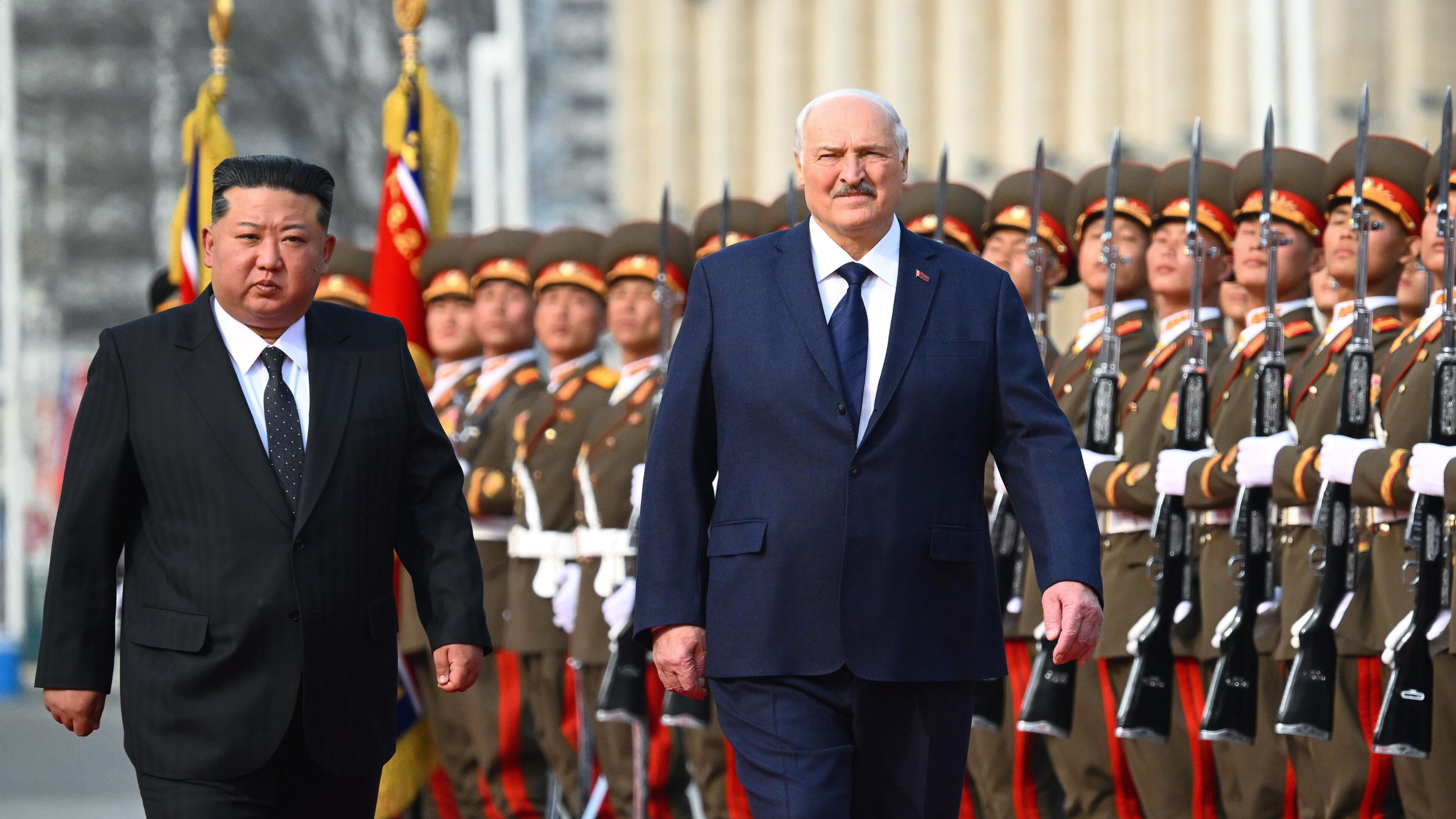 In this photo released by Belarus' Presidential Press Service, North Korea's leader Kim Jong Un, left, and Belarusian President Alexander Lukashenko attend an official meeting ceremony in Pyongyang, North Korea, Wednesday, March 25, 2026. (Belarus' Presidential Press Service via AP)