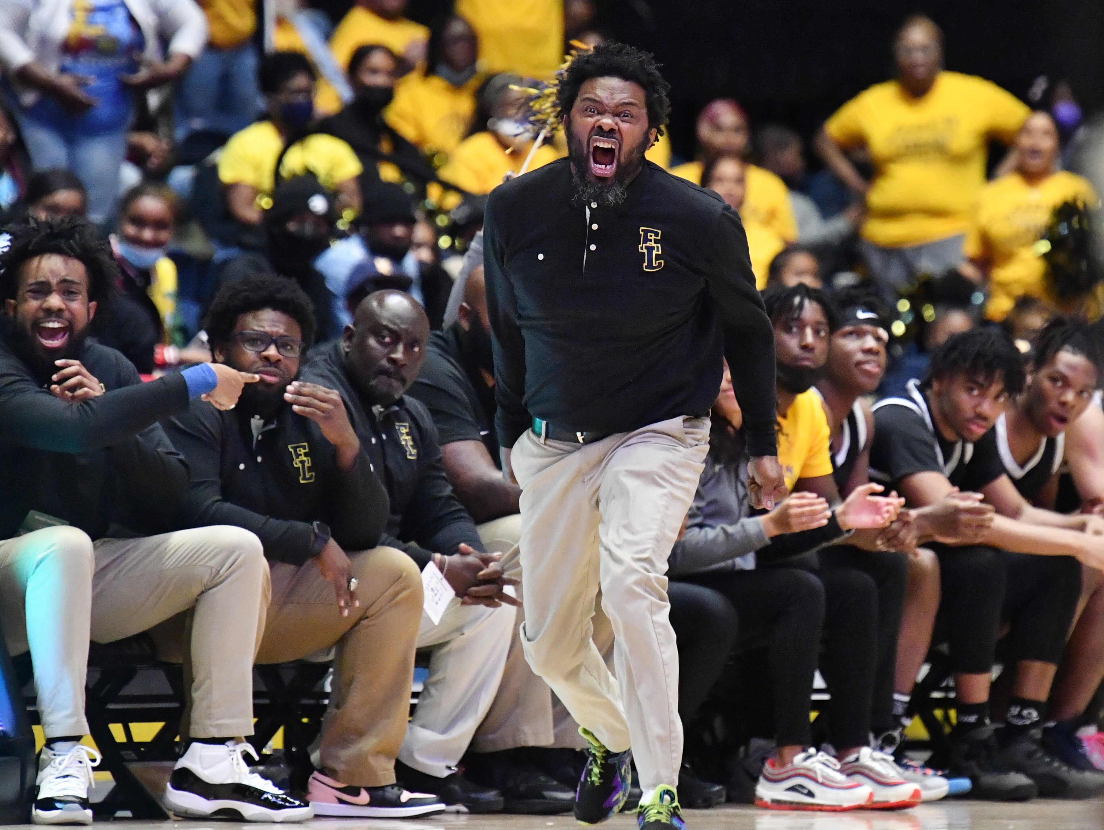 Eagle’s Landing's head coach Elliott Montgomery shouts instructions. (Hyosub Shin / Hyosub.Shin@ajc.com)