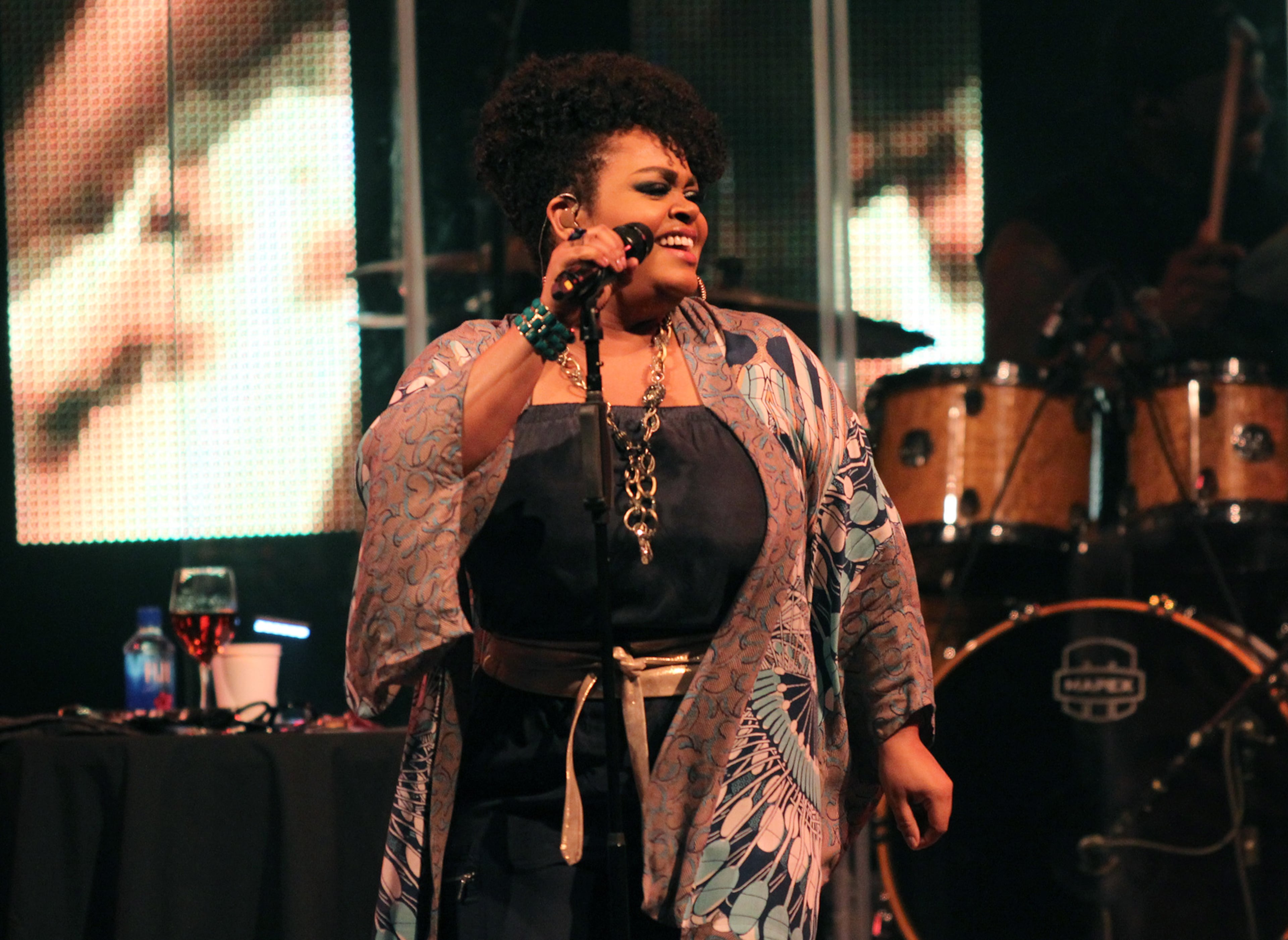 Singer/songwriter Jill Scott launches into the hit single "Gimme," from her 2001 album "Experience: Jill Scott 826+," at Chastain Park Amphitheatre in Atlanta, Sunday, Aug. 2, 2015. She followed with "The Real Thing, " from the same album, and "Whatever," from her second album, "Beautifully Human." (Akili-Casundria Ramsess/Special to the AJC)