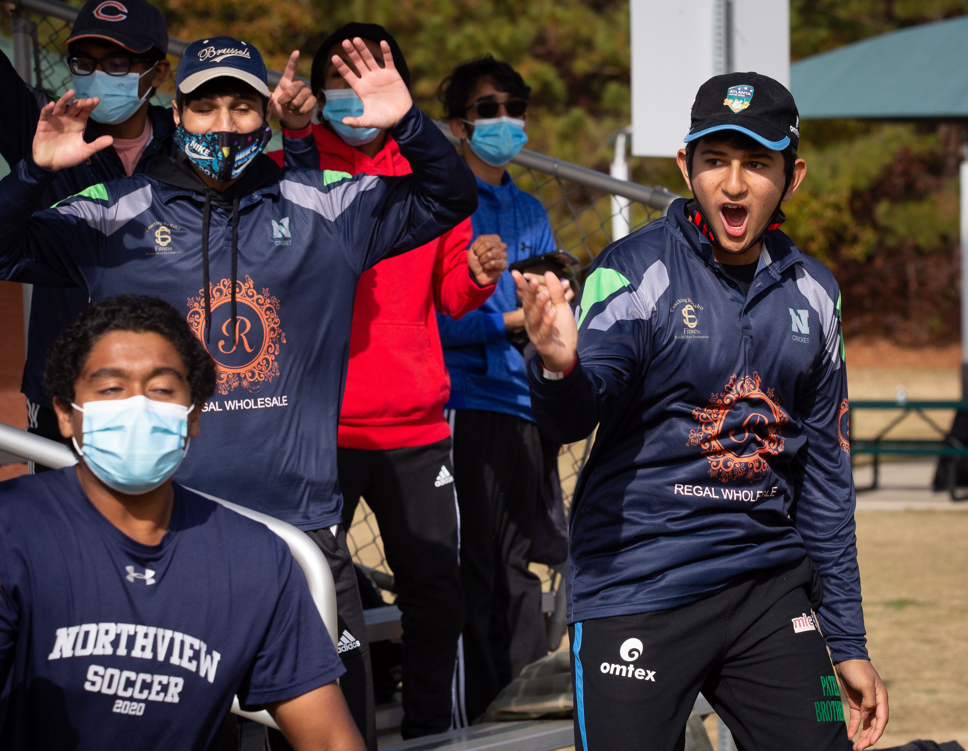 Northview High Scool cricket team player Viraj Vaghela (R) cheers on his teammates during their game with Lambert High School at Shakerag Park in Johns Creek Sunday, November 6, 2020. STEVE SCHAEFER FOR THE ATLANTA JOURNAL-CONSTITUTION