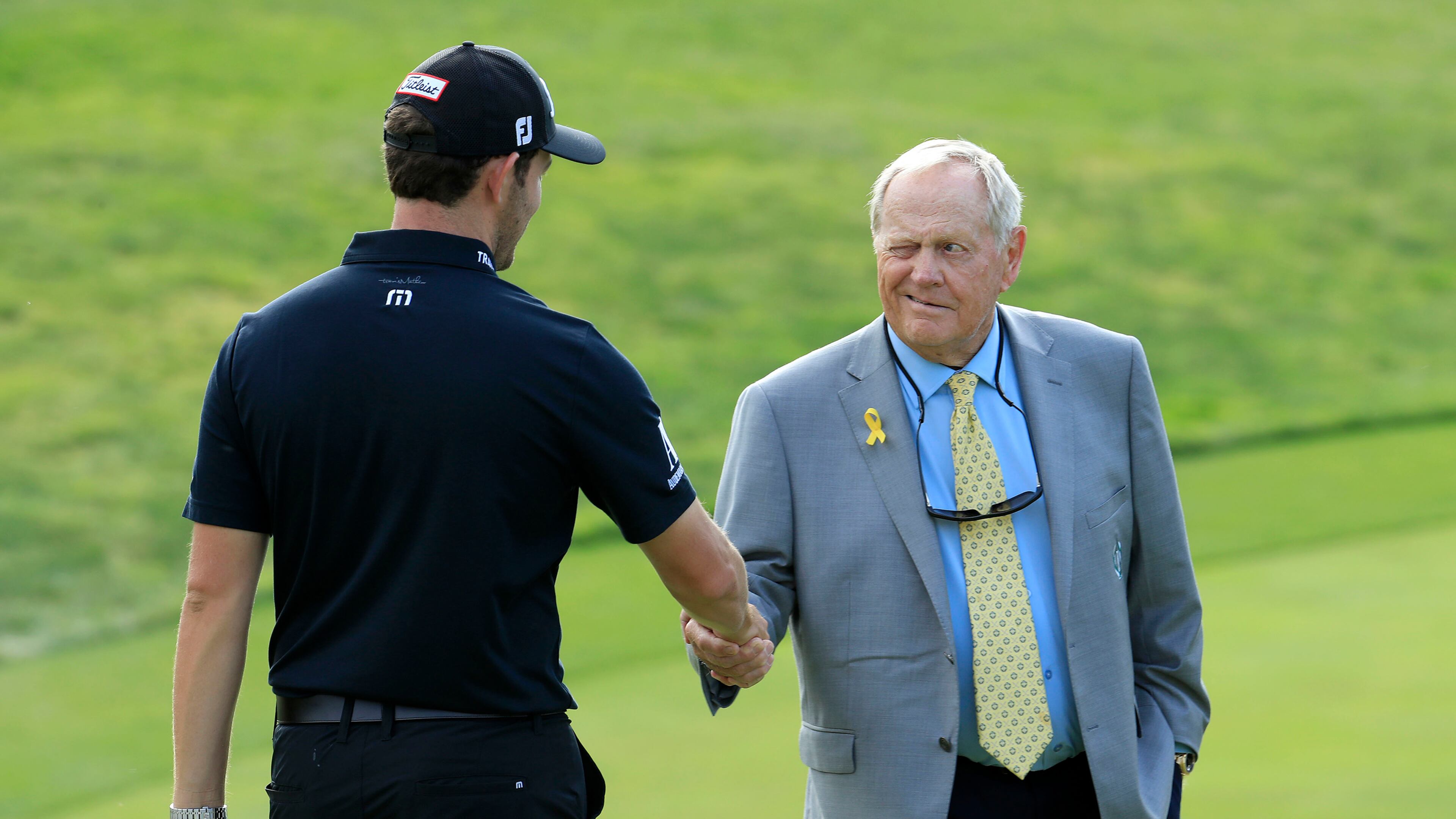 Patrick Cantlay shakes hands with Jack Nicklaus after winning The Memorial Tournament Presented by Nationwide at Muirfield Village Golf Club on June 2, 2019 in Dublin, Ohio. (Andy Lyons/Getty Images/TNS)