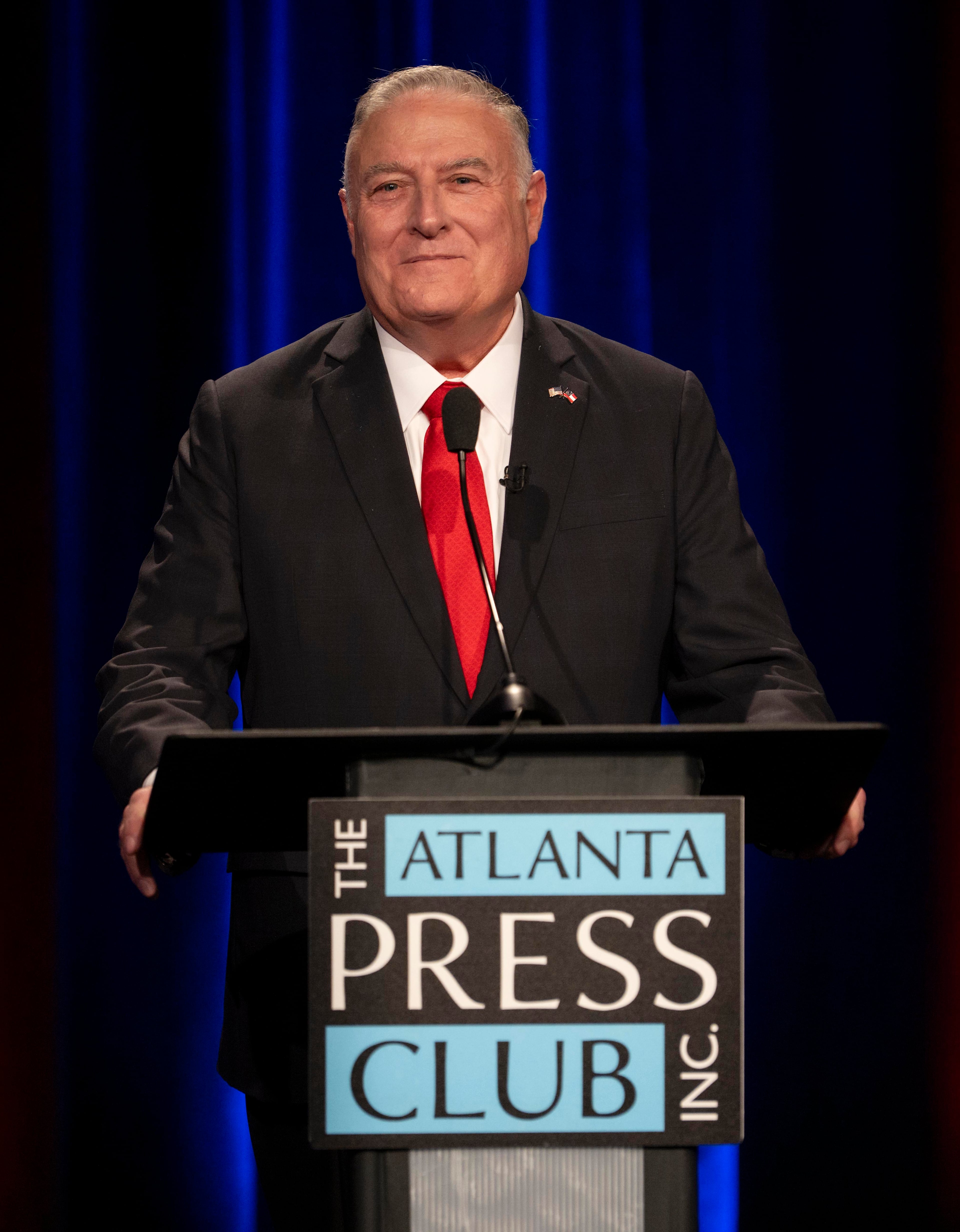 Incumbent Republican Insurance Commissioner John King debates his Democratic Party opponent Keisha Waites (not shown) at the Atlanta Press Club's Loudermilk-Young Debate Series held Tuesday, Oct. 13, at the studios of Georgia Public Broadcasting. (Pool photo by Brian Cahn)