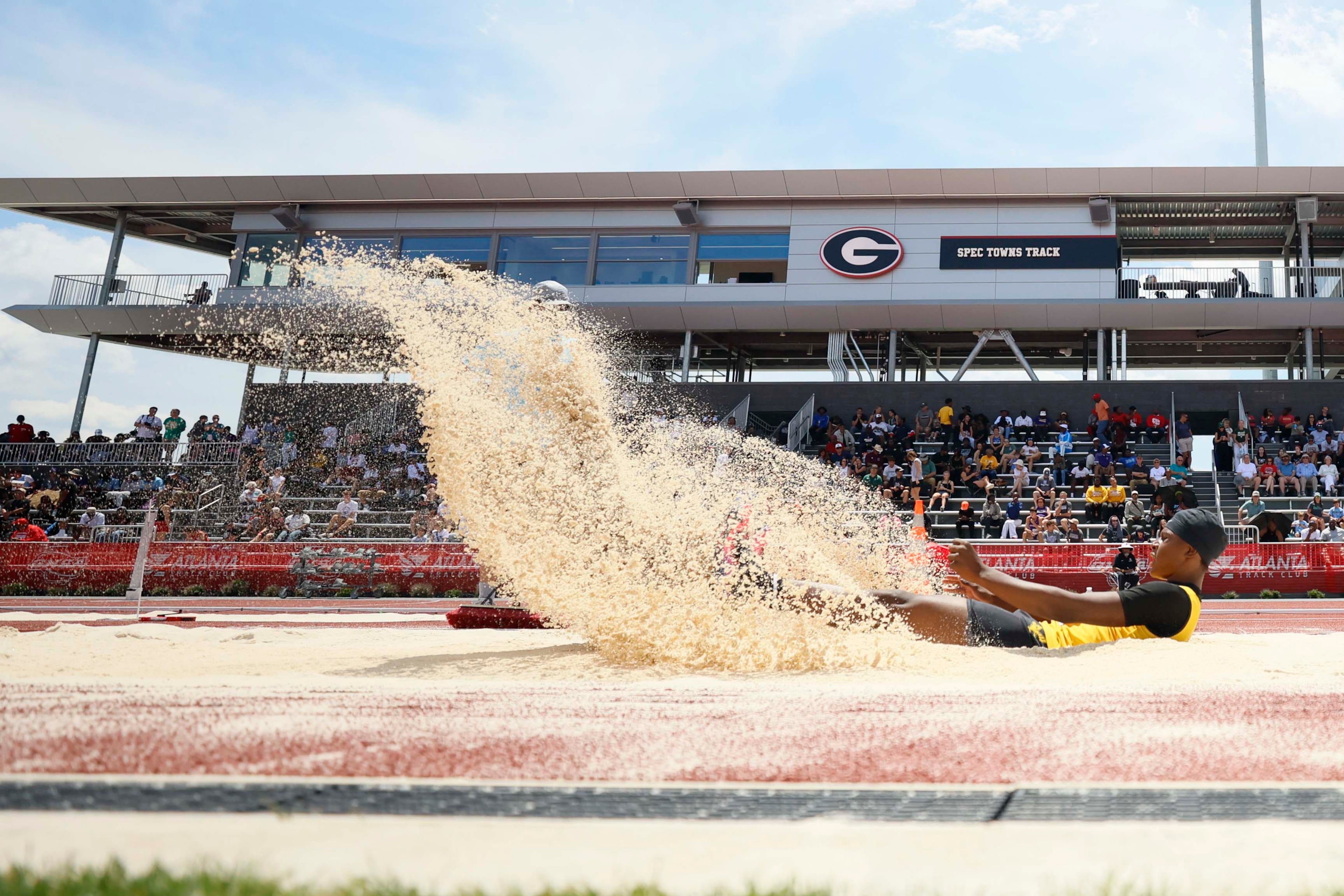 An athlete attempts a long jump at the GHSA track and field state championships held at UGA's Spec Towns Track on Monday, May 11, 2026, in Athens.
(Miguel Martinez/AJC)