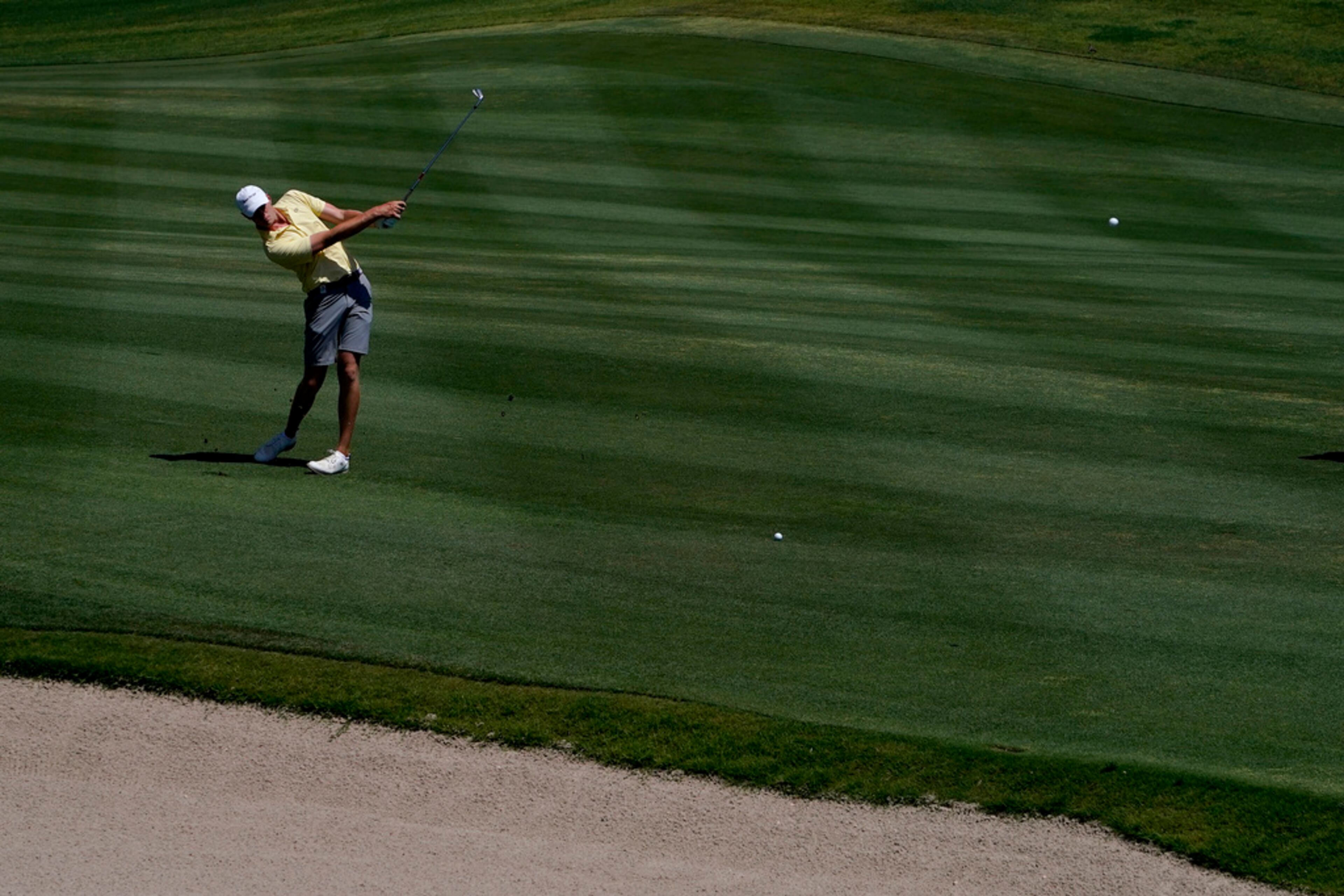 Georgia Tech golfer Bartley Forrester hits from the second fairway during the final round of the NCAA college men's match play golf championship, Wednesday, May 31, 2023, in Scottsdale, Ariz. Georgia Tech lost 3-1. (AP Photo/Matt York)