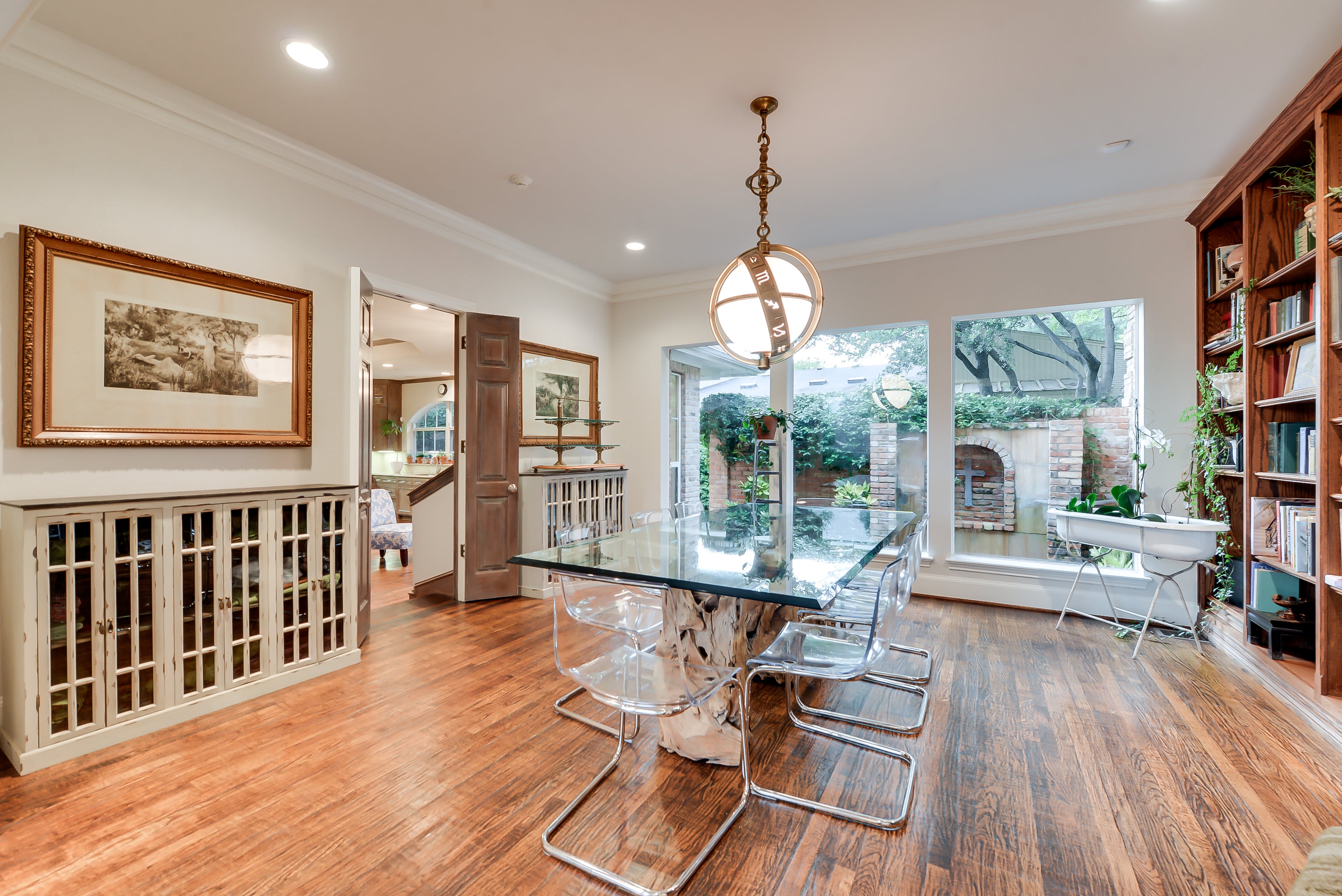 This July 15, 2013, photo courtesy of Rogers Healy and Associates Real Estate shows Chuck Norris' Dallas home, which was also featured as Texas Ranger Cordell Walker's house in the former television series "Walker, Texas Ranger." Rogers Healy, of Rogers Healy and Associates Real Estate has listed the 7,362-square-foot home for $1.2 million. The seven-bathroom and four-bedroom has been extensively renovated since the show ended in 2001. (AP Photo/Rogers Healy and Associates Real Estate)