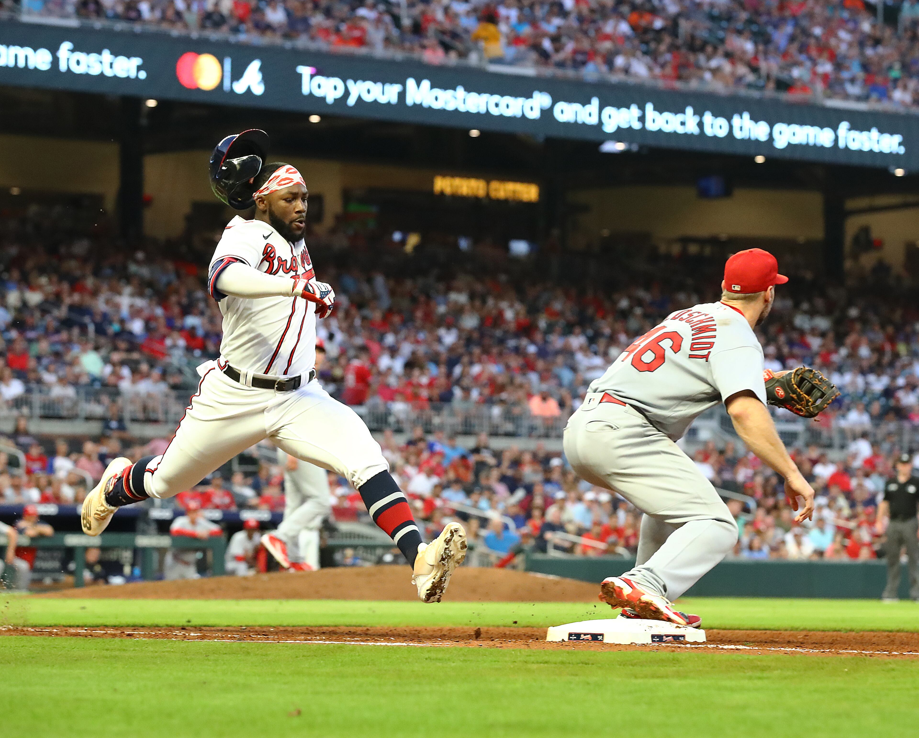 Braves outfielder Michael Harris beats the throw to St. Louis Cardinals first baseman Paul Goldschmidt for a single during the fourth inning in a MLB baseball game on Tuesday, July 5, 2022, in Atlanta. “Curtis Compton / Curtis.Compton@ajc.com”