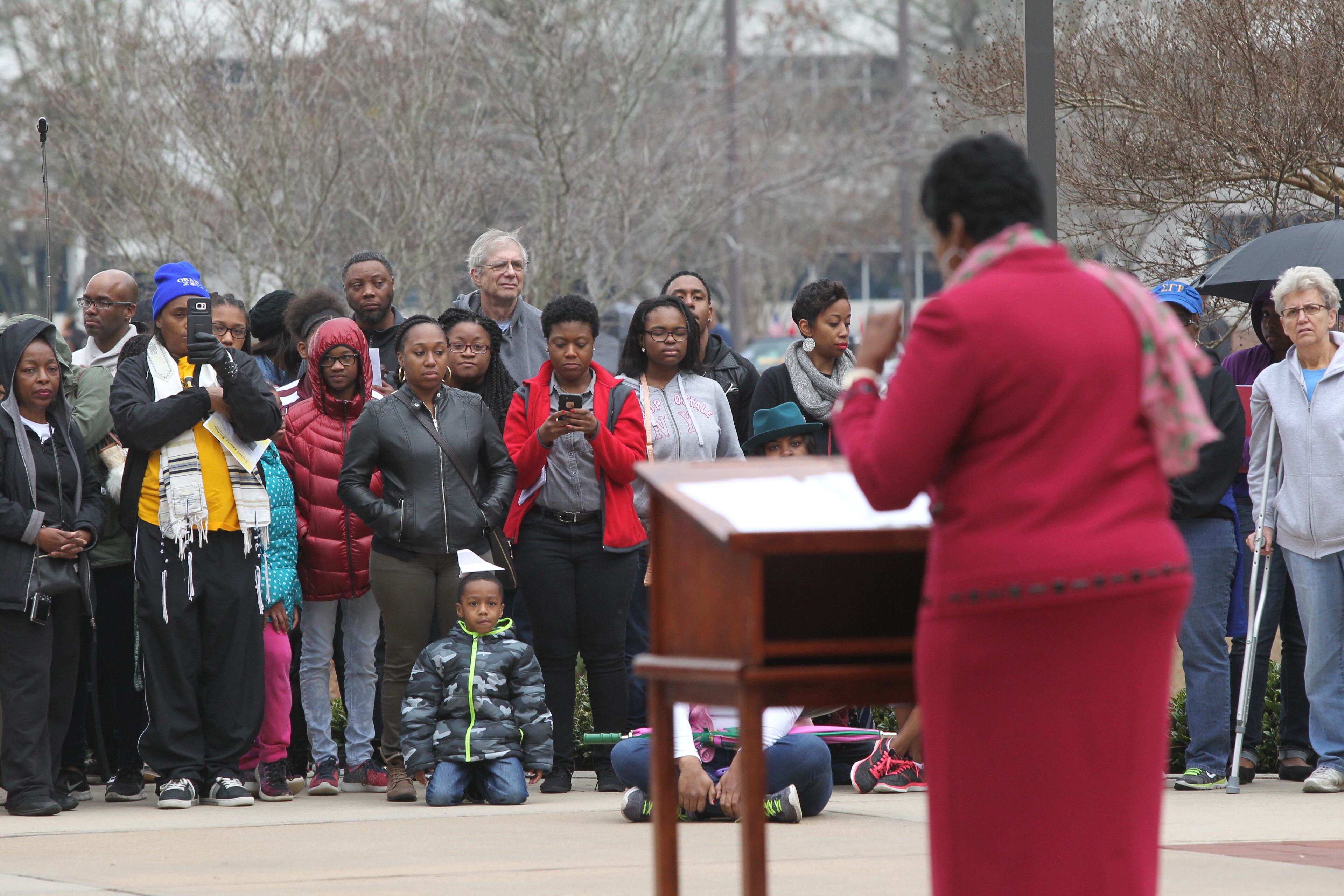 January 16, 2017, Atlanta - Grand Marshall of the parade Dr. Francis E. Davis gives a short speech for a crowd before the start of the MLK Day parade in Lawrenceville, Georgia, on Monday, January 16, 2017. (HENRY TAYLOR / HENRY.TAYLOR@AJC.COM)