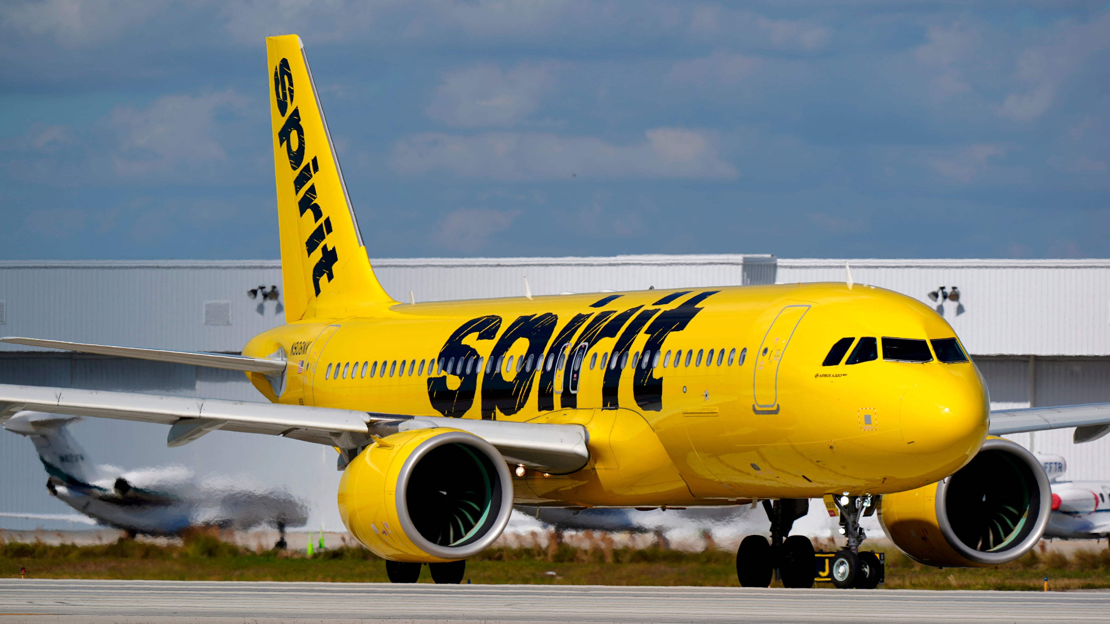 FILE - A Spirit Airlines Airbus A320 prepares to take off from Fort Lauderdale-Hollywood International Airport, Jan. 19, 2021, in Fort Lauderdale, Fla. (AP Photo/Wilfredo Lee, File)