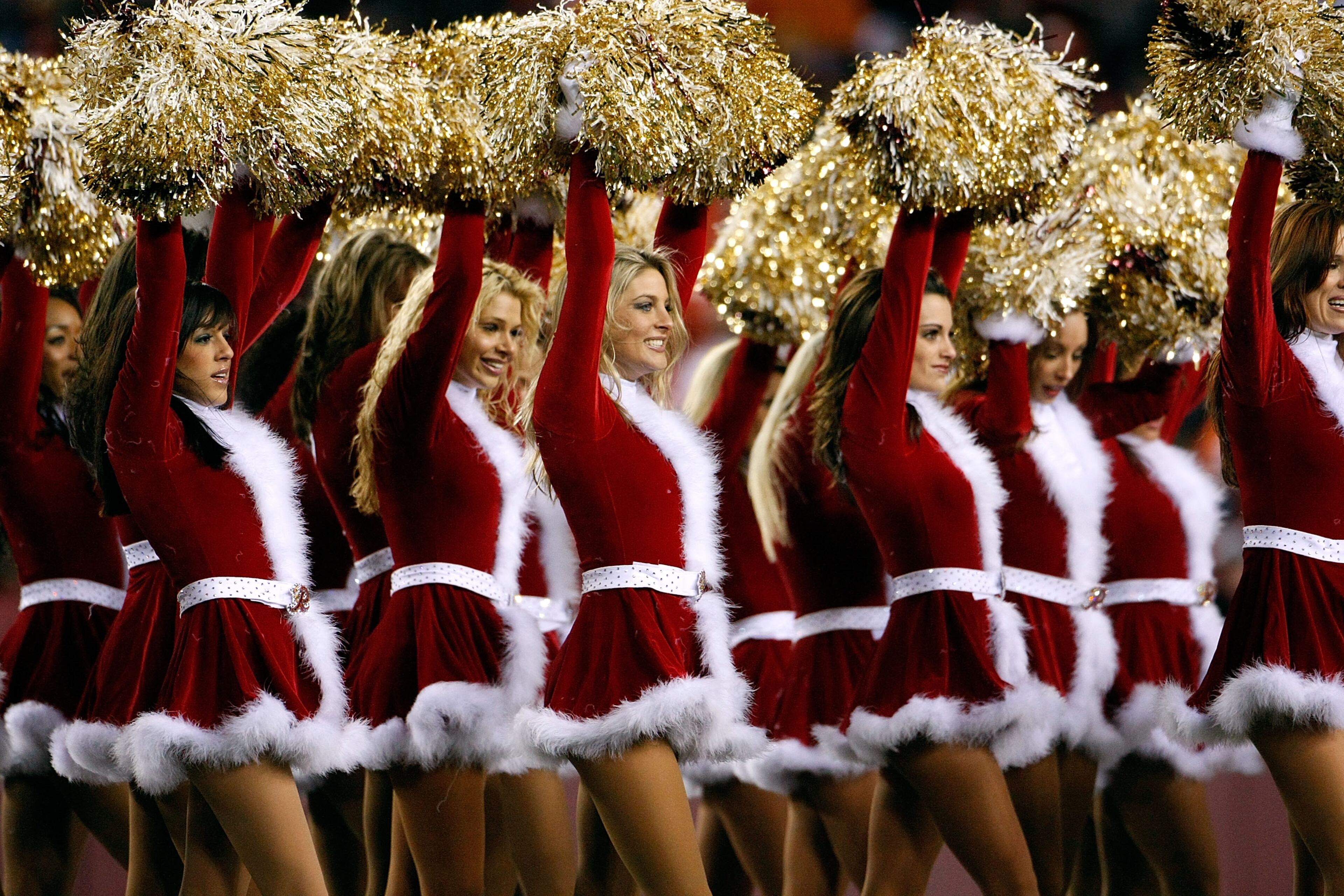 Washington Redskins cheerleaders perform in Christmas costumes during halftime in a game against the Chicago Bears at FedEx Field Dec. 6, 2007 in Landover, Md.