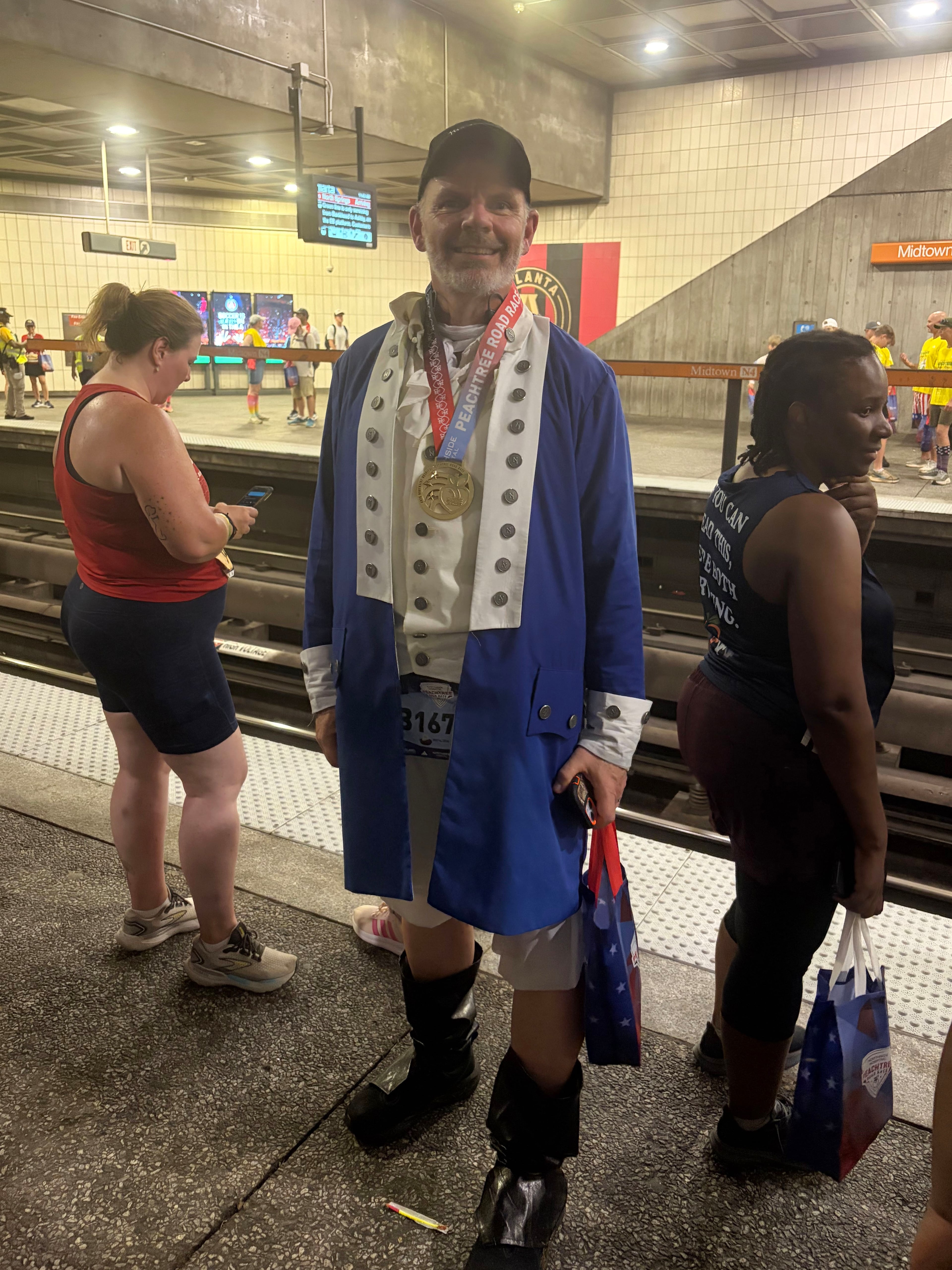 The Peachtree Road Race awakened the revolutionary in runners like 56-year-old Dan Fully, who dressed as Aaron Burr. Fully came from Rhode Island to run in his first Peachtree today.