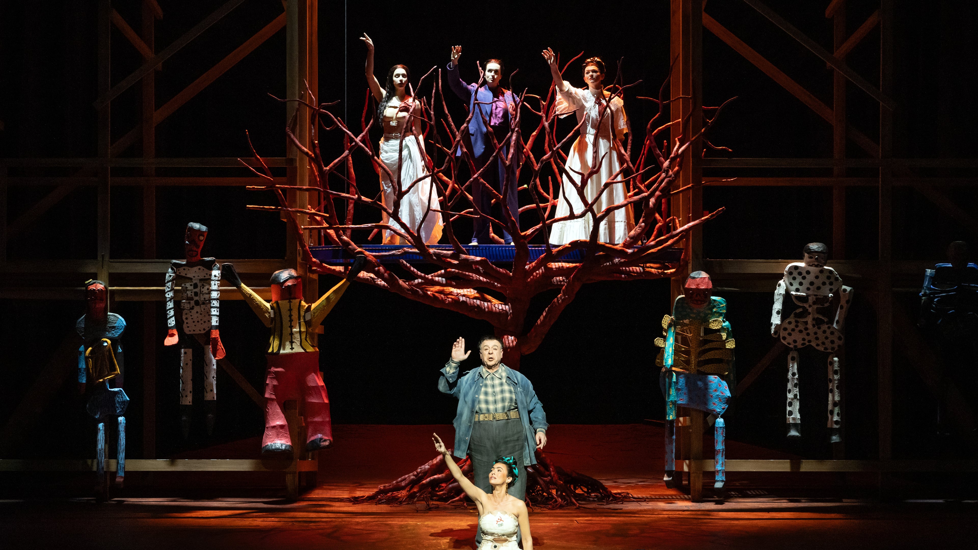 This image released by the Metropolitan Opera shows mezzo-soprano Isabel Leonard as Frida Kalho, foreground center, and baritone Carlos Álvarez as Diego Rivera in a rehearsal for “El Último Sueño de Frida y Diego,” on May 11, 2026, at the Metropolitan Opera in New York. (Marty Sohl/MetOpera via AP)