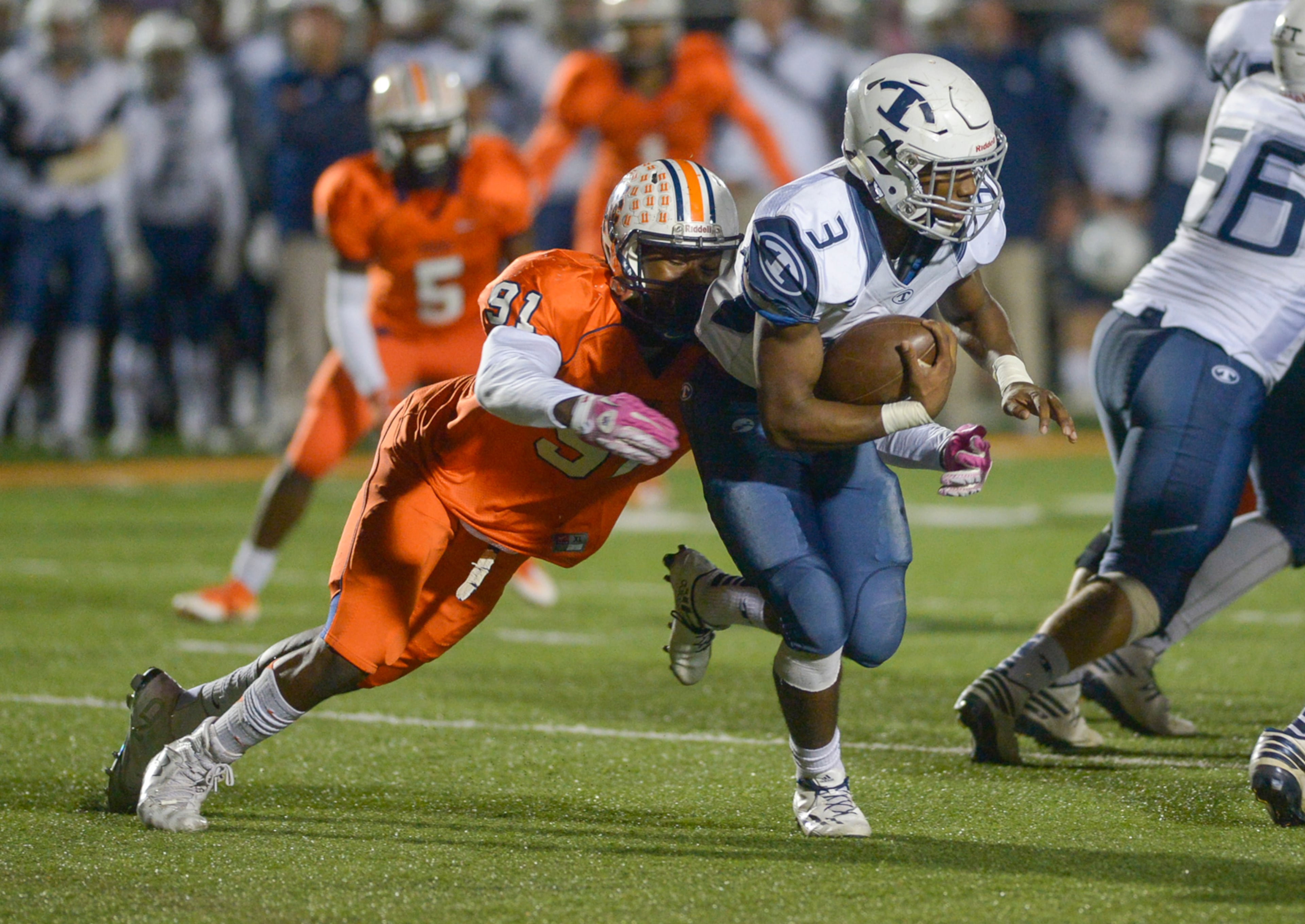 Kennesaw, Ga. --North Cobb junior DL Thurman Geathers (91) closes in on Tift County senior RB Brenton Jones (3) in the first half of their game at North Cobb in the first round of football playoffs Friday November 11, 2016. SPECIAL/Daniel Varnado