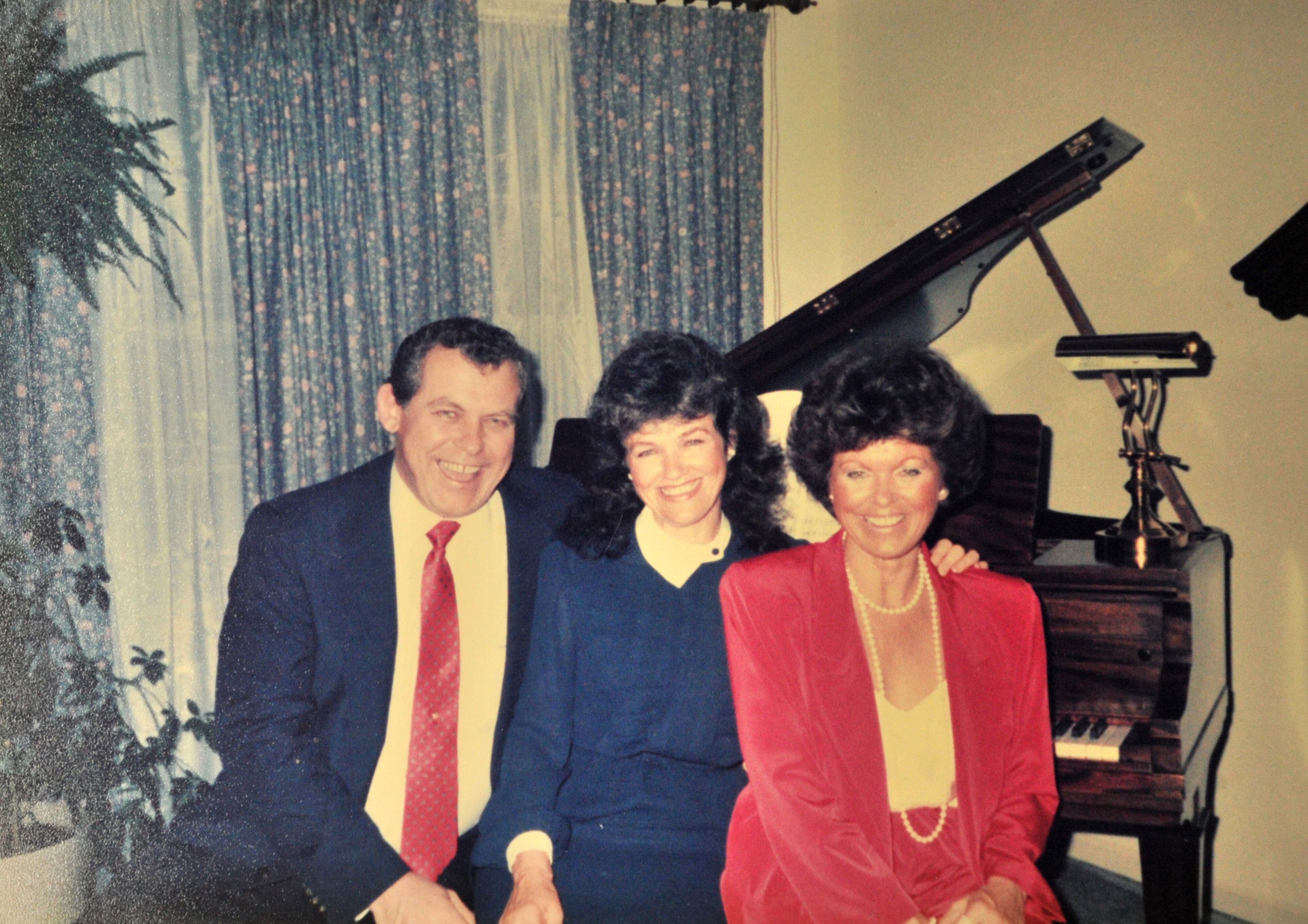 Linda Case (center) with her deceased brother Dan Mayes and sister Becky Parrett in 1987.