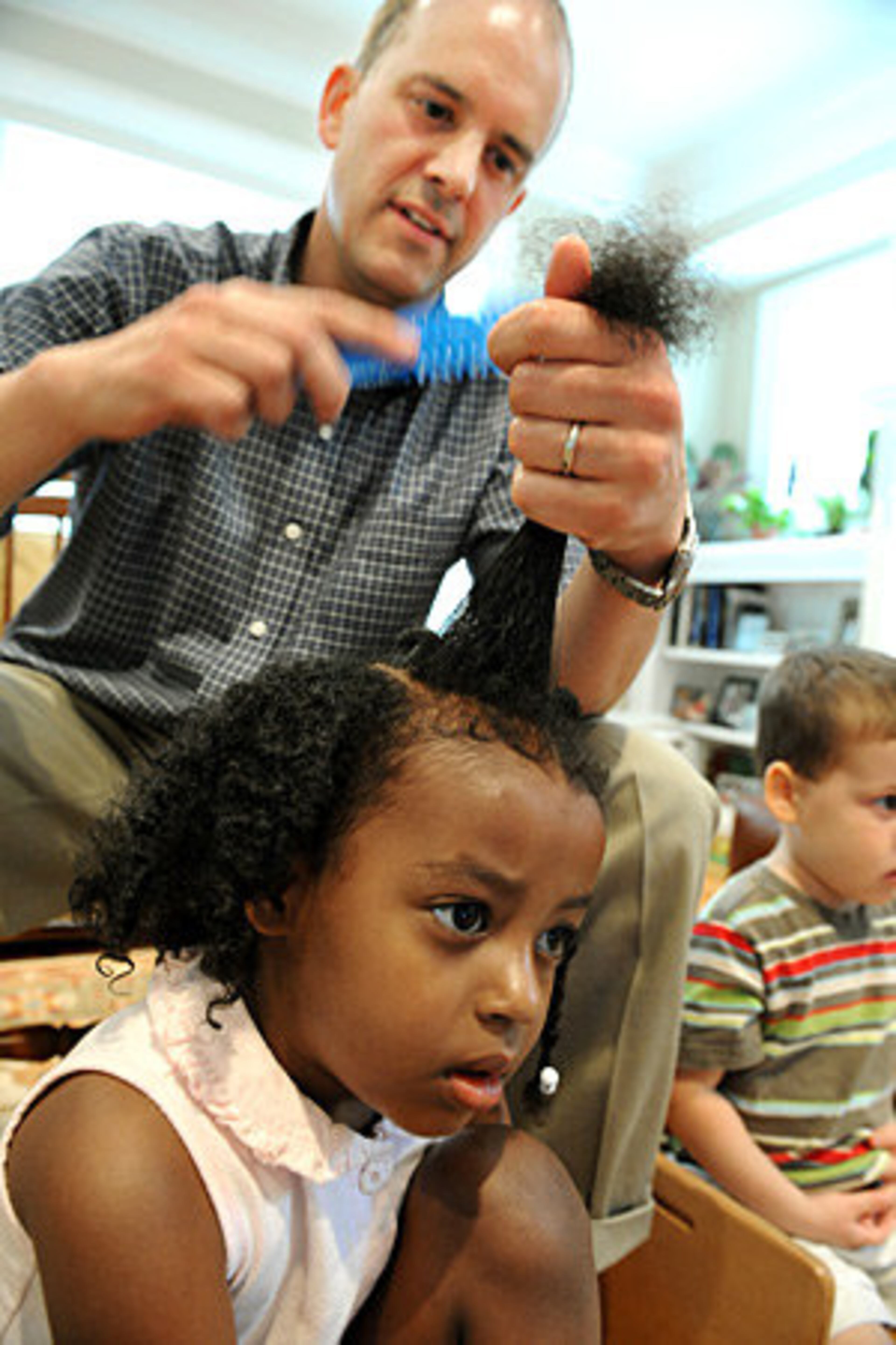 Dad Clifton and mom Jennifer initially were uncertain what to do with Miriam's hair after bringing her home. They considered just letting it go, as a sign of freedom. They wanted others to accept her, regardless of her looks.