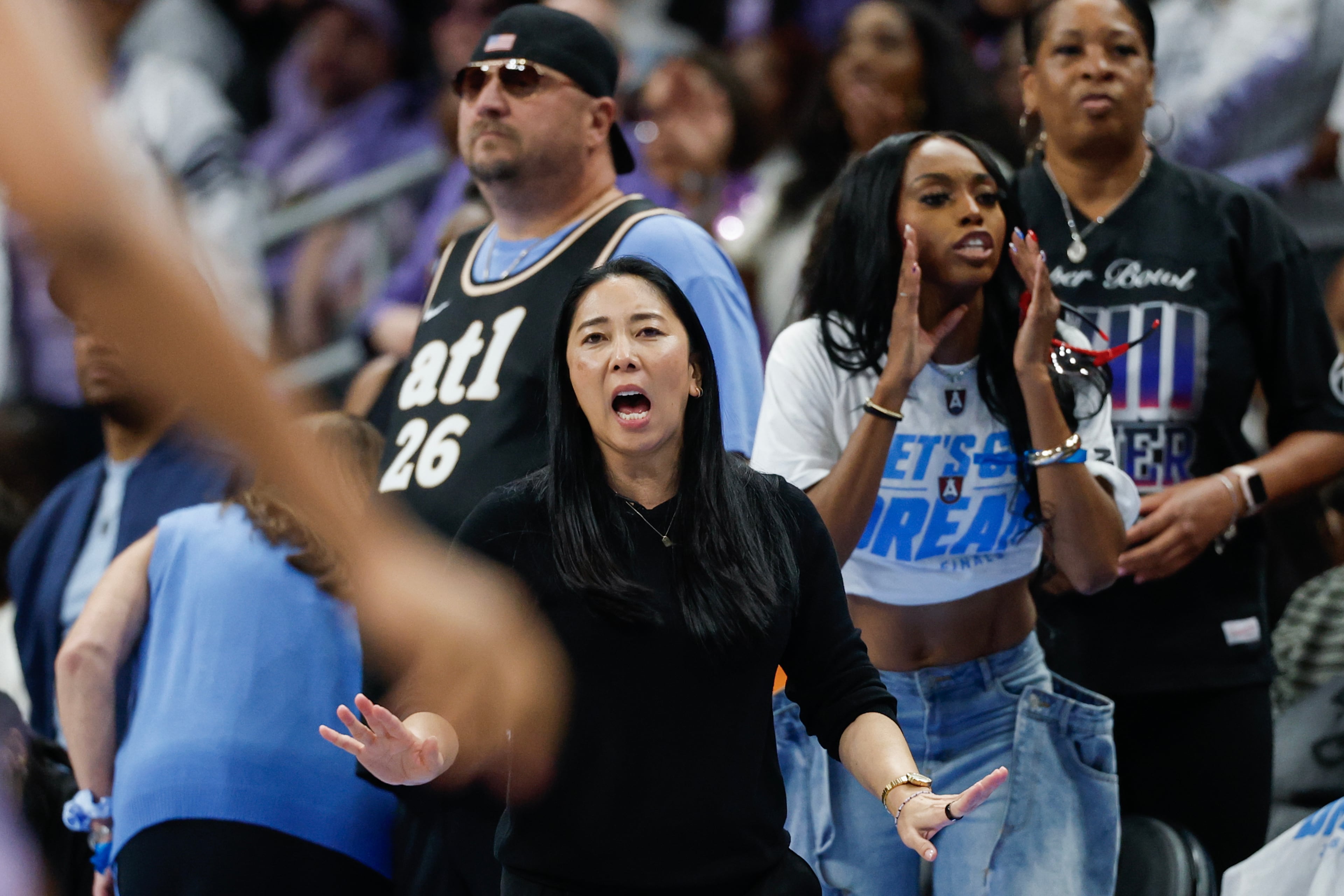 Golden State Valkyries head coach Natalie Nakase (center) reacts during the second half of Game 4 of the WNBA Finals between the Atlanta Dream and the Golden State Valkyries, Saturday, Oct. 24, 2026, in Atlanta. (Erik S. Lesser for the AJC)
