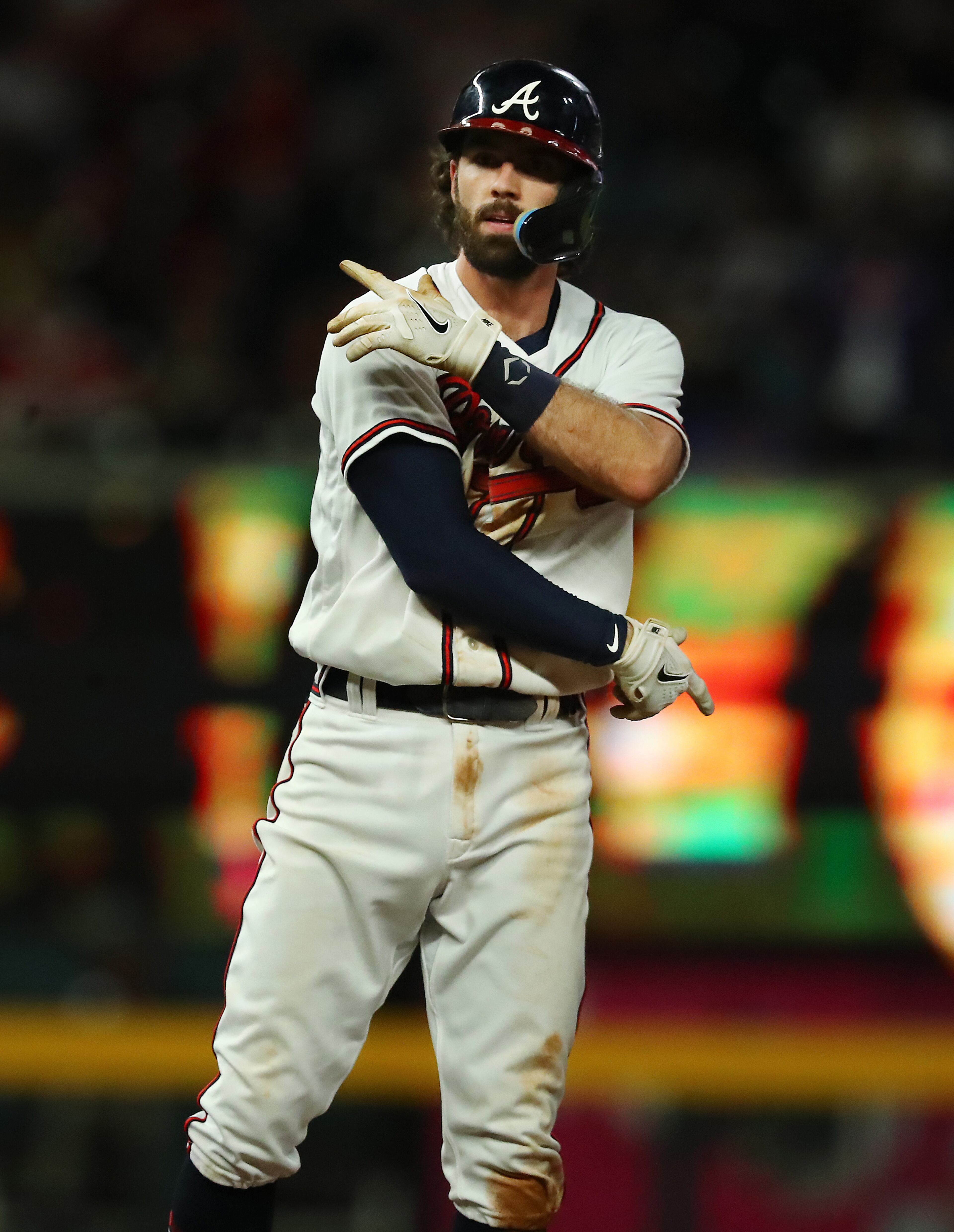 Braves shortstop Dansby Swanson advances to second base and reacts to his RBI-single to score outfielder Ronald Acuna for a 4-0 lead over the New York Mets during the seventh inning in a MLB baseball game on Tuesday, August 16, 2022, in Atlanta. “Curtis Compton / Curtis Compton@ajc.com