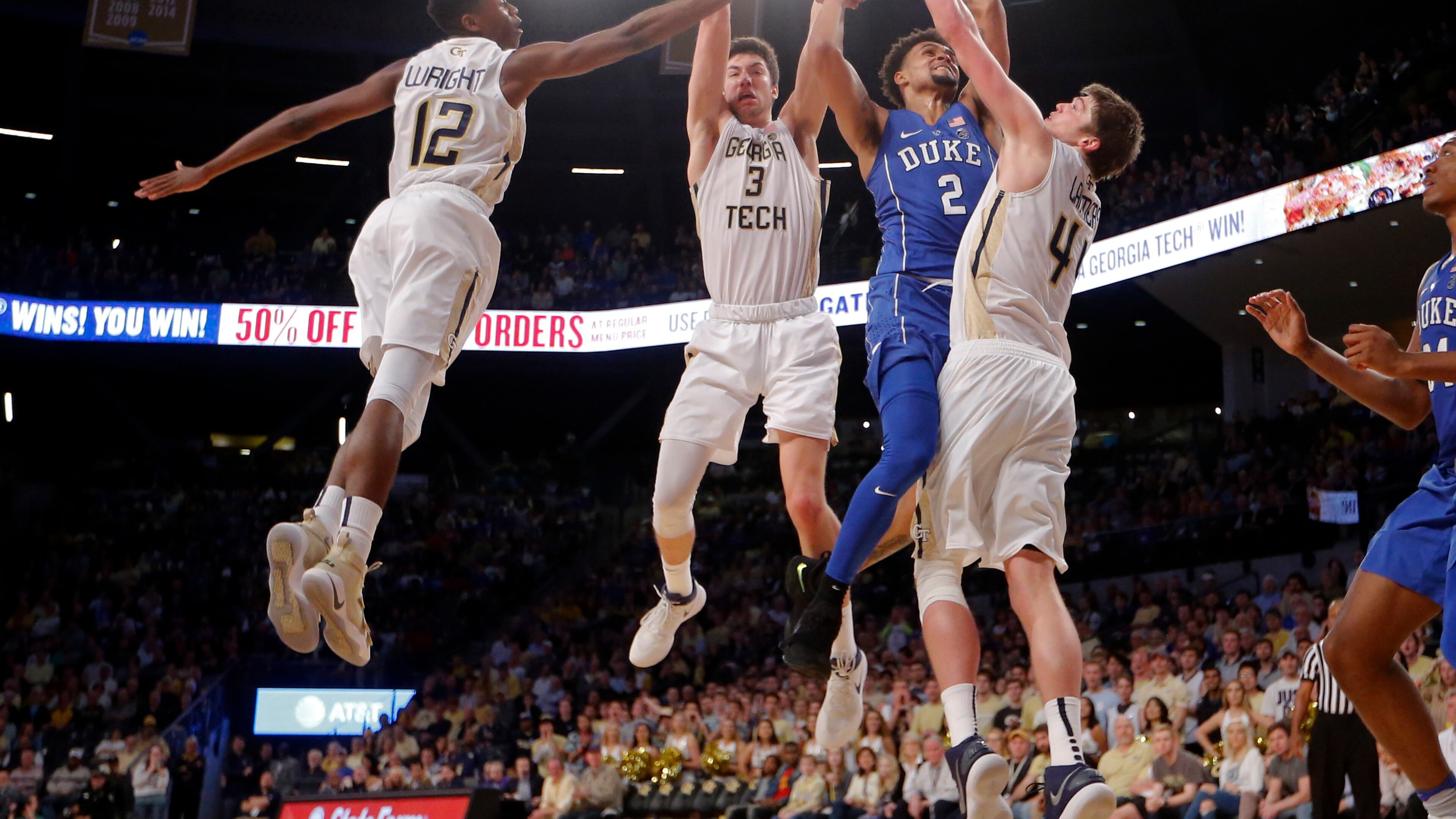 Duke guard Gary Trent Jr. (2) battles Georgia Tech forward Moses Wright (12), Georgia Tech forward Evan Cole (3) and Georgia Tech center Ben Lammers (44) in the second of an NCAA college basketball game Sunday, Feb. 11, 2018, in Atlanta. Duke won 80-69. (AP Photo/John Bazemore)