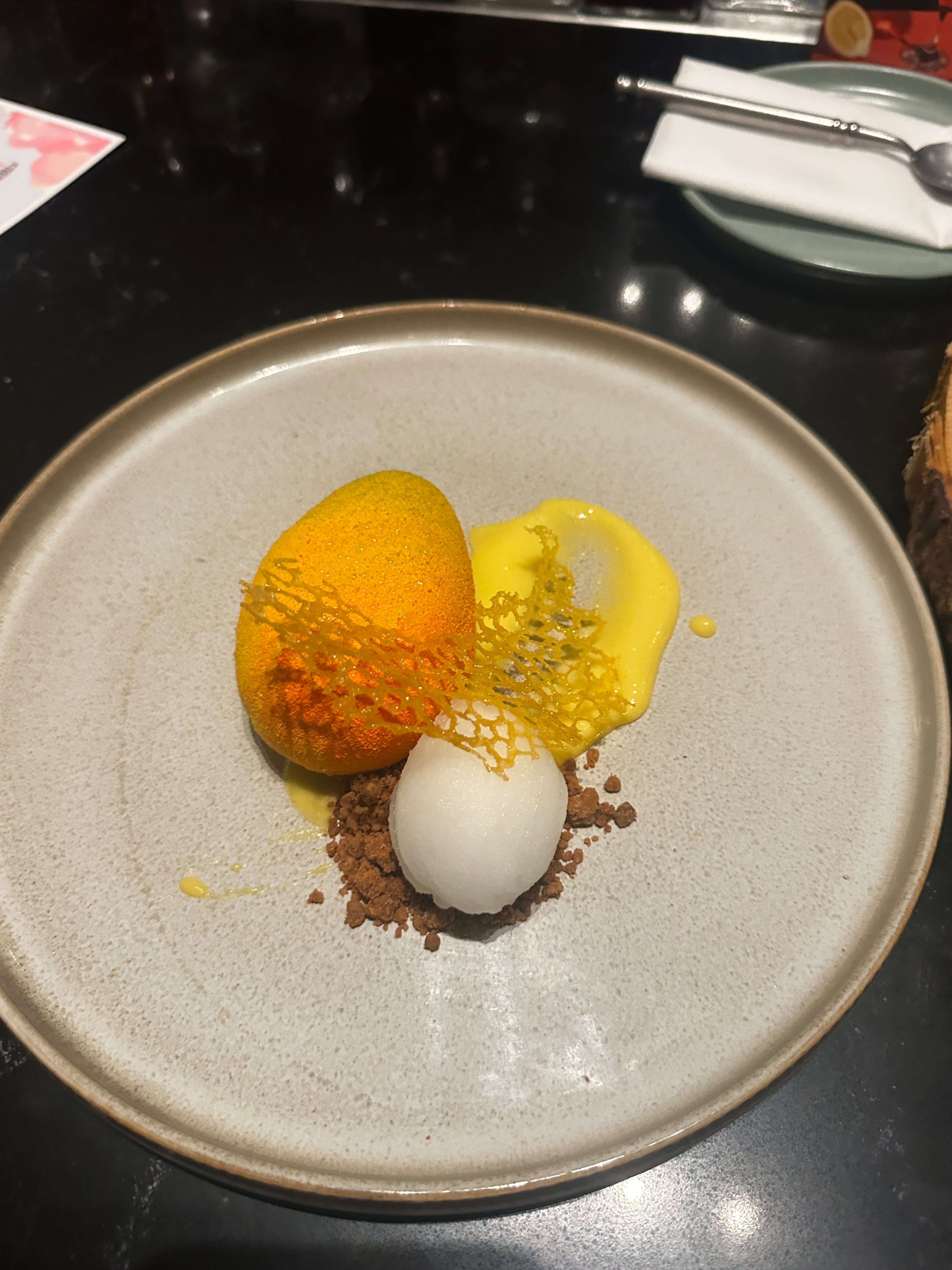 Mangoes and Champagne dessert from Witchsugar. (Lia Picard for the AJC)