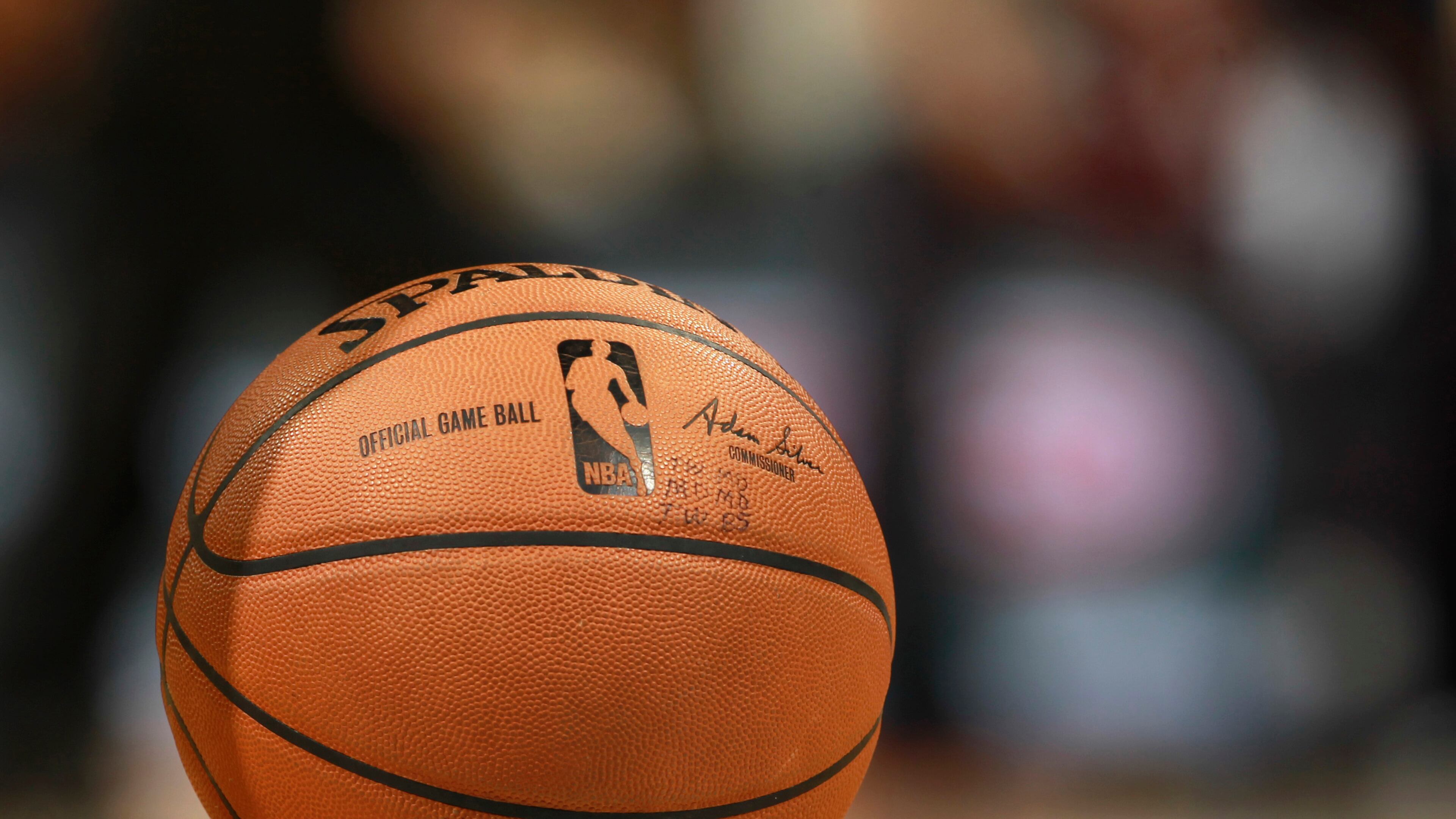 Ball sits on court during time out in the fourth quarter of the Golden State Warriors' 116-112 victory over the Denver Nuggets in an NBA basketball game in Denver on Wednesday, April 16, 2014. (AP Photo/David Zalubowski)