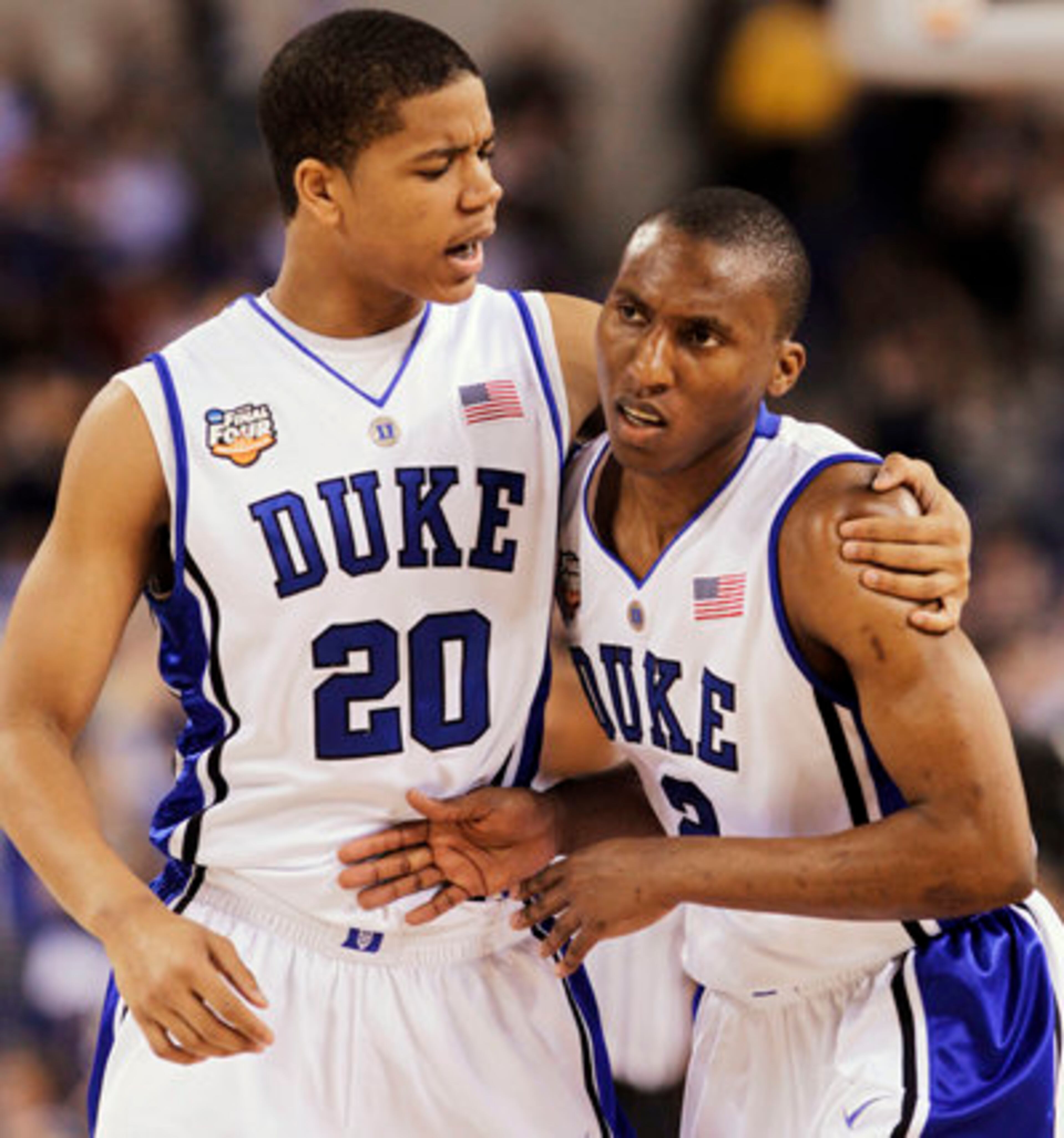Duke players Andre Dawkins (20) and Nolan Smith react to a play against Butler during the first half of the men's NCAA Final Four college basketball championship game Monday, April 5, 2010, in Indianapolis.