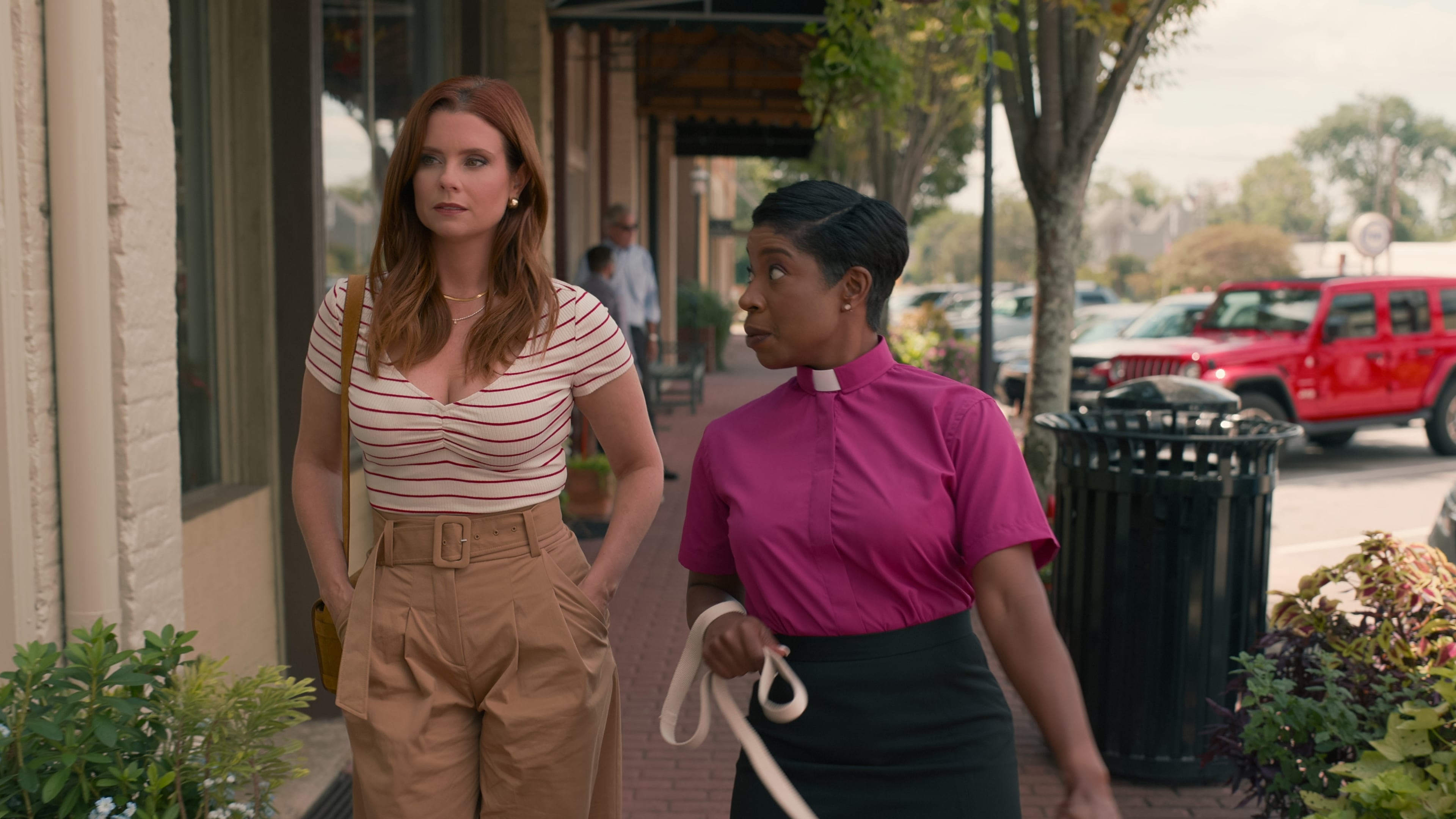 Sweet Magnolias. (L to R) JoAnna Garcia Swisher as Maddie, Tracey Bonner as Pastor June Wilkes in episode 308 of Sweet Magnolias. Cr. Courtesy of Netflix © 2023