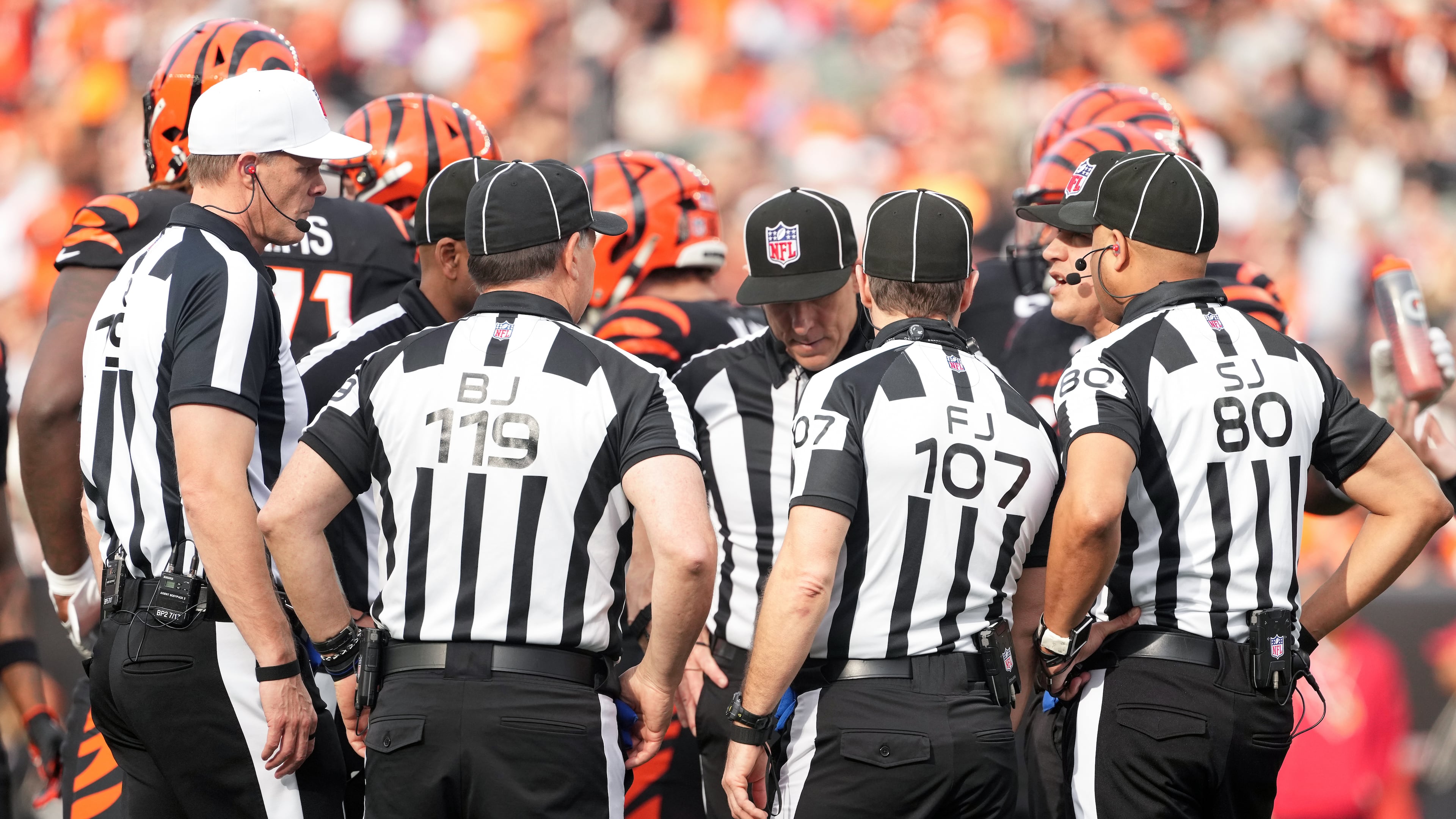 FILE - Referee Clay Martin (19), far left, talks with the officiating crew during an NFL football game between the Arizona Cardinals and the Cincinnati Bengals, Sunday, Dec. 28, 2025, in Cincinnati. (AP Photo/Kareem Elgazzar, file)