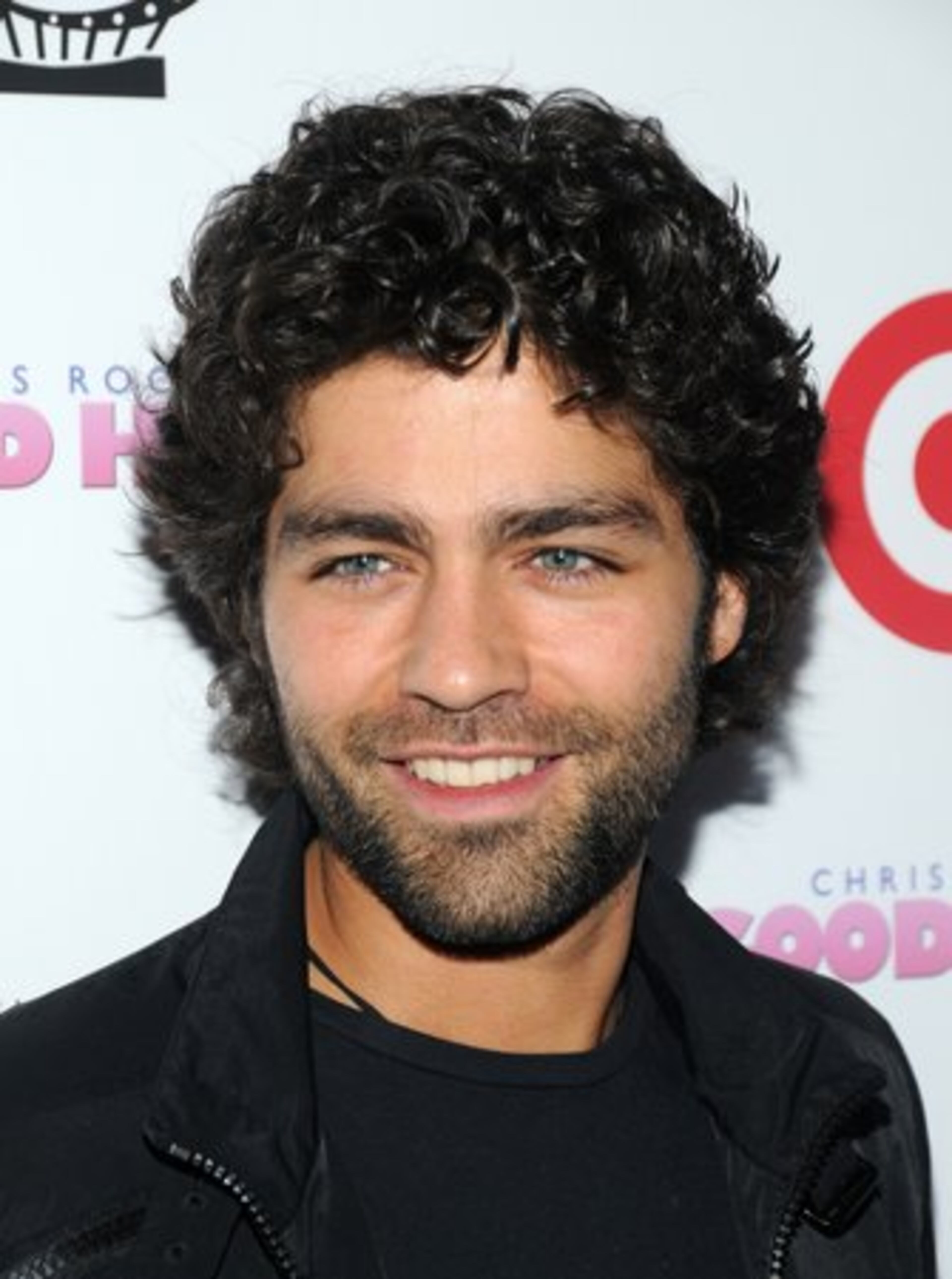 Actor Adrian Grenier shows off his curly 'good hair' at the Cinema Society screening.