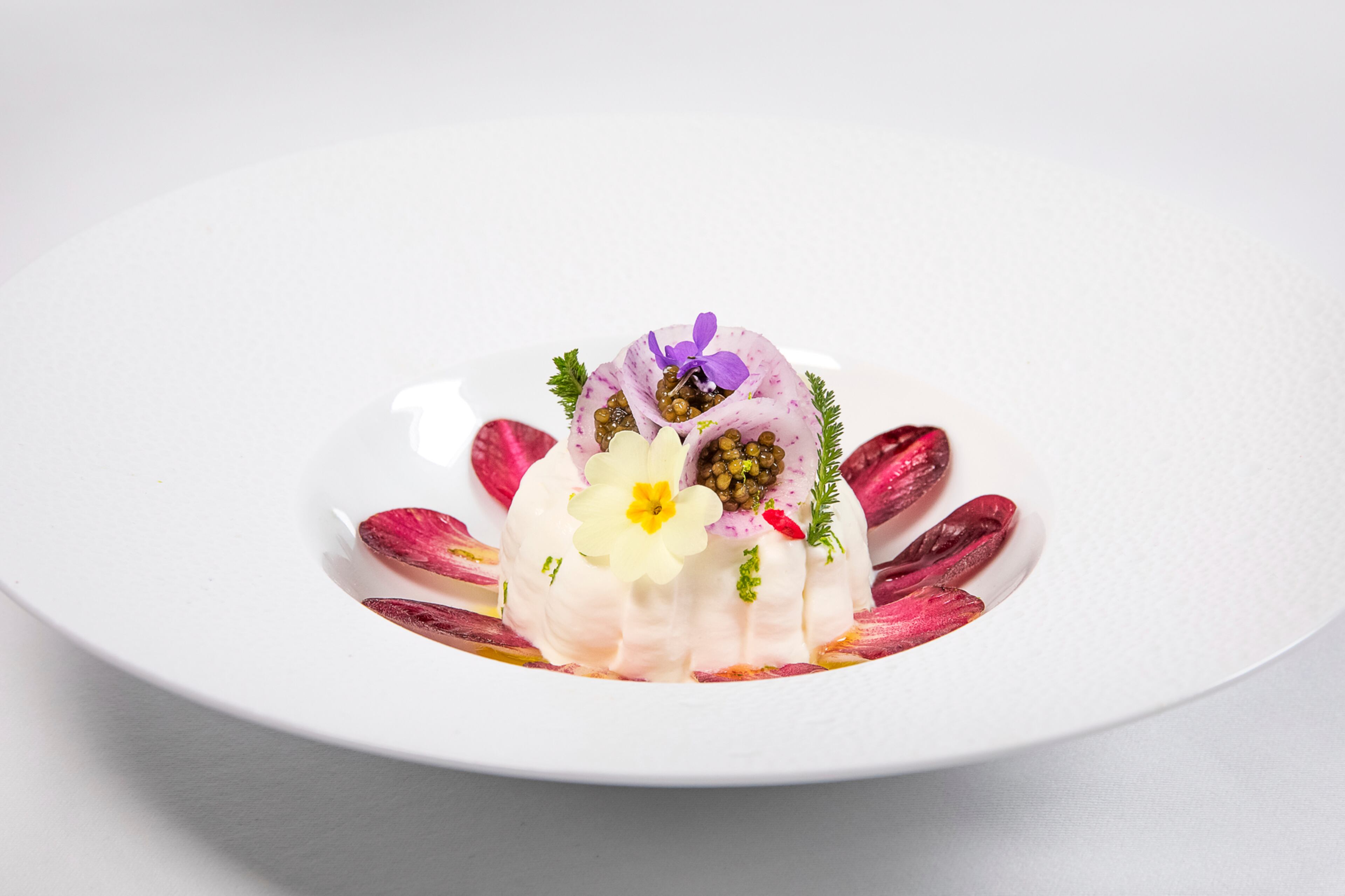 A tartare de fera, showcasing the white fish that lives in Lake Geneva, is one of the artistic creations of Hôtel Royal chef Patrice Vander.
Courtesy of Evian Resort