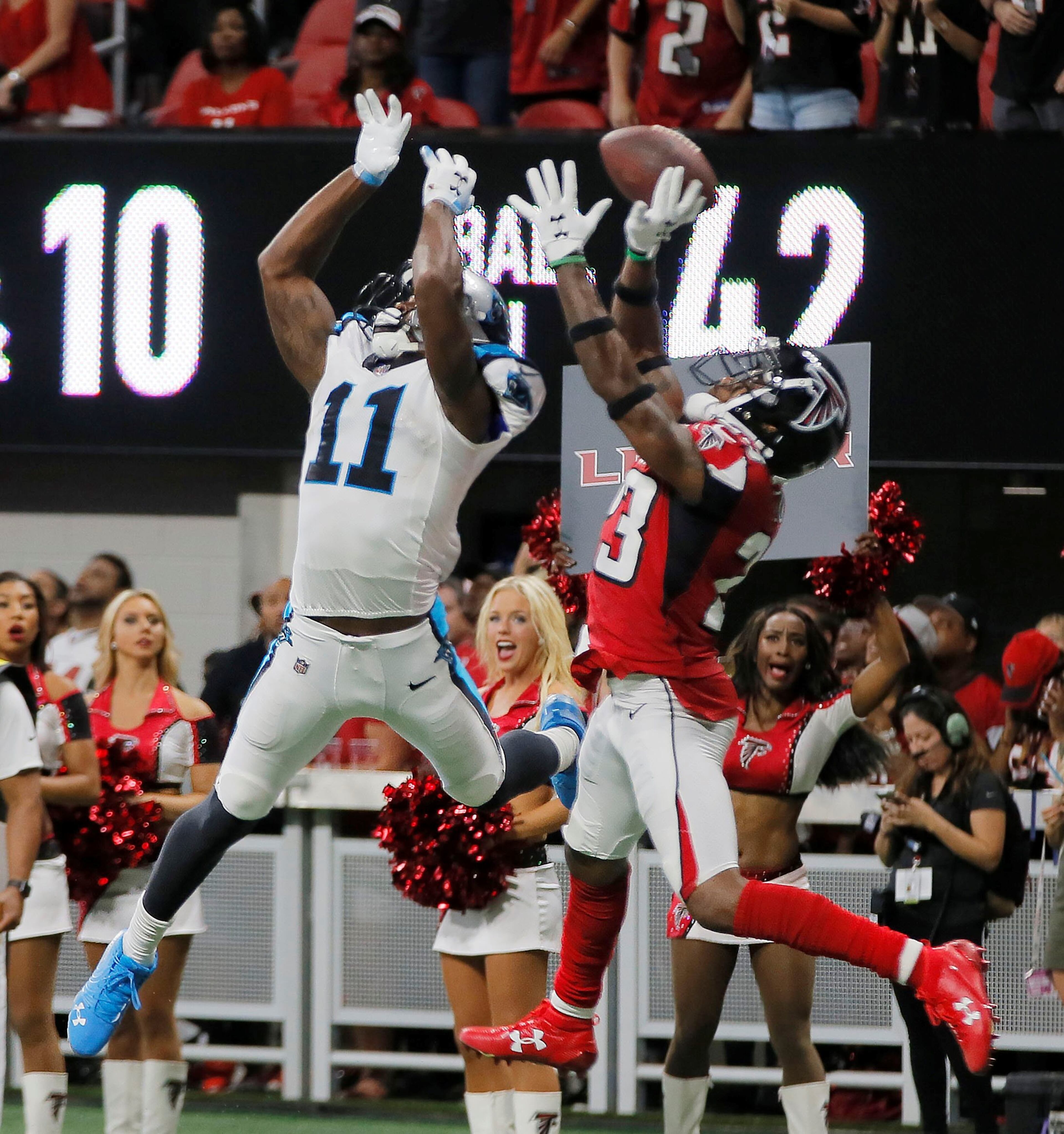 9/16/18 - Atlanta - On the Last play of the game, Carolina Panthers wide receiver Torrey Smith (11) can't make the catch which was defended by Atlanta Falcons defensive back Robert Alford (23). The Atlanta Falcons played the Carolina Panthers in an NFL football game Sunday, Sept 16, 2018, at Mercedes-Benz Stadium in Atlanta, GA. BOB ANDRES /BANDRES@AJC.COM