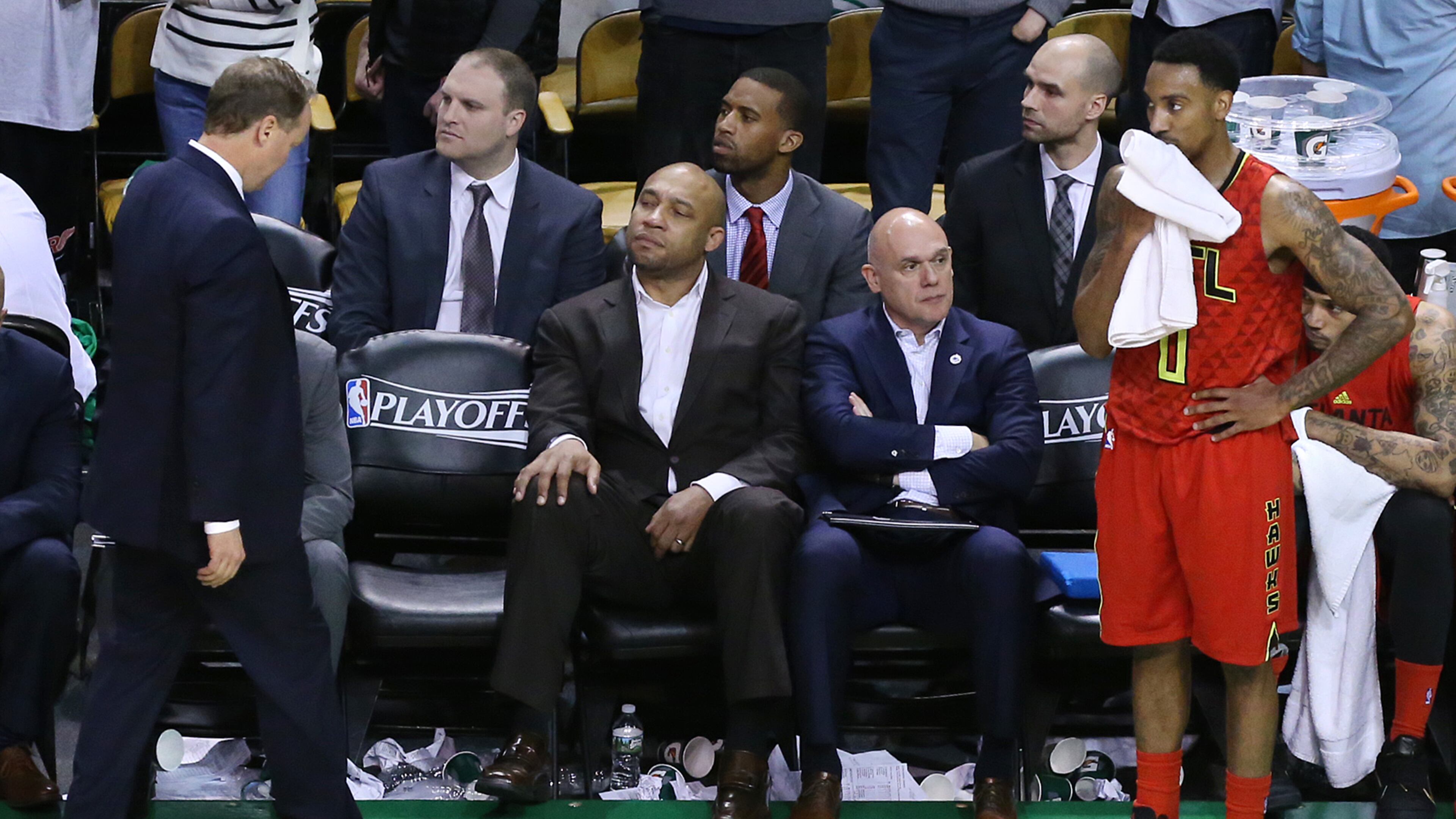 **** SECONDARY PHOTO **** 042416 BOSTON: Hawks head coach Mike Budenholzer (left) and guard Jeff Teague react to falling to the Celtics 104-95 in overtime in Game 4 of an NBA basketball first-round playoff series on Sunday, April 24, 2016, in Boston. The Celtics victory ties the series two games to two heading back to Atlanta for game five. Curtis Compton / ccompton@ajc.com