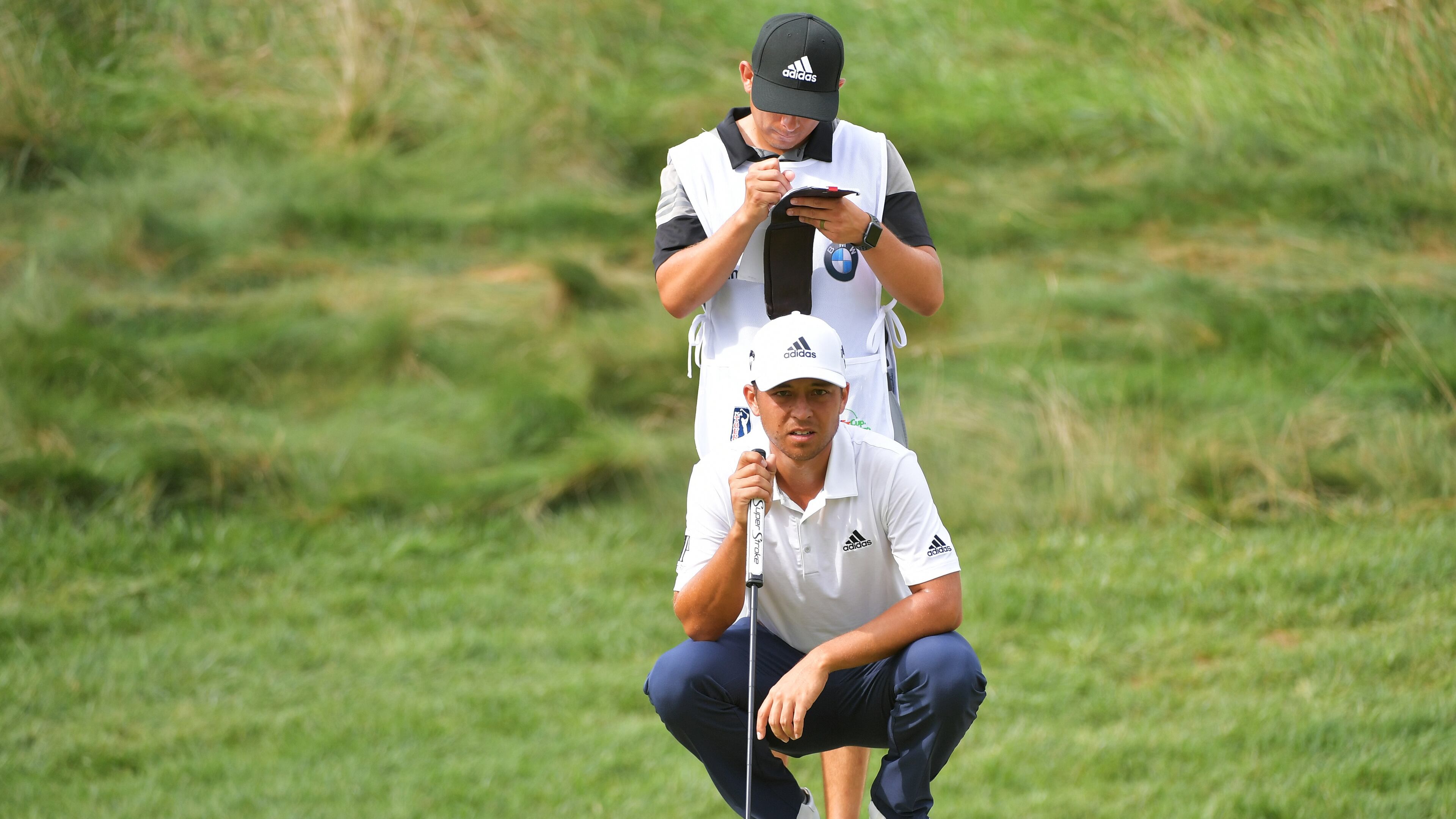Looking for answers on the greens Friday at the BMW Championship, Xander Schauffele mostly found them. (Drew Hallowell/Getty Images)
