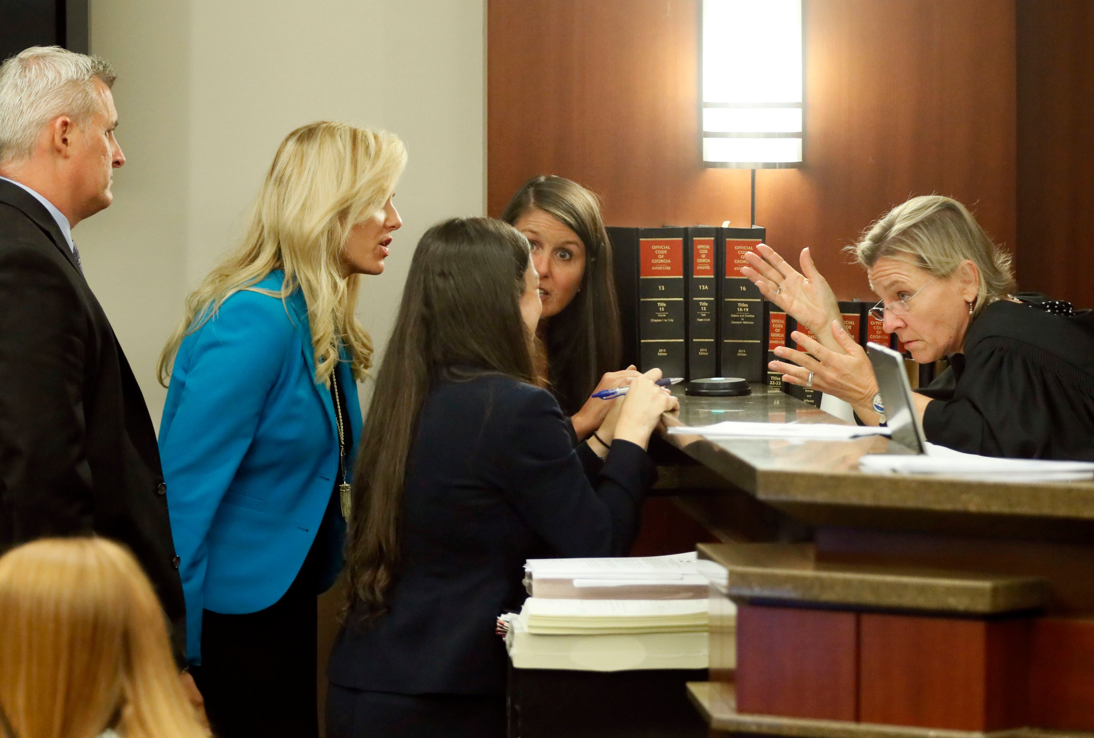 COBB COURT - Judge Ann Harris confers with attorneys from both sides before deciding to continue the case to another day. One of two men convicted in a hit-and-run that killed two teens was in the Cobb County courtroom of Judge Ann Harris Tuesday seeking a new trial. Garrett Kyle Anderson is currently serving a 15-year sentence. He was one of two men involved in a chase that ended in a hit-and-run crash that killed two teens. BOB ANDRES /BANDRES@AJC.COM