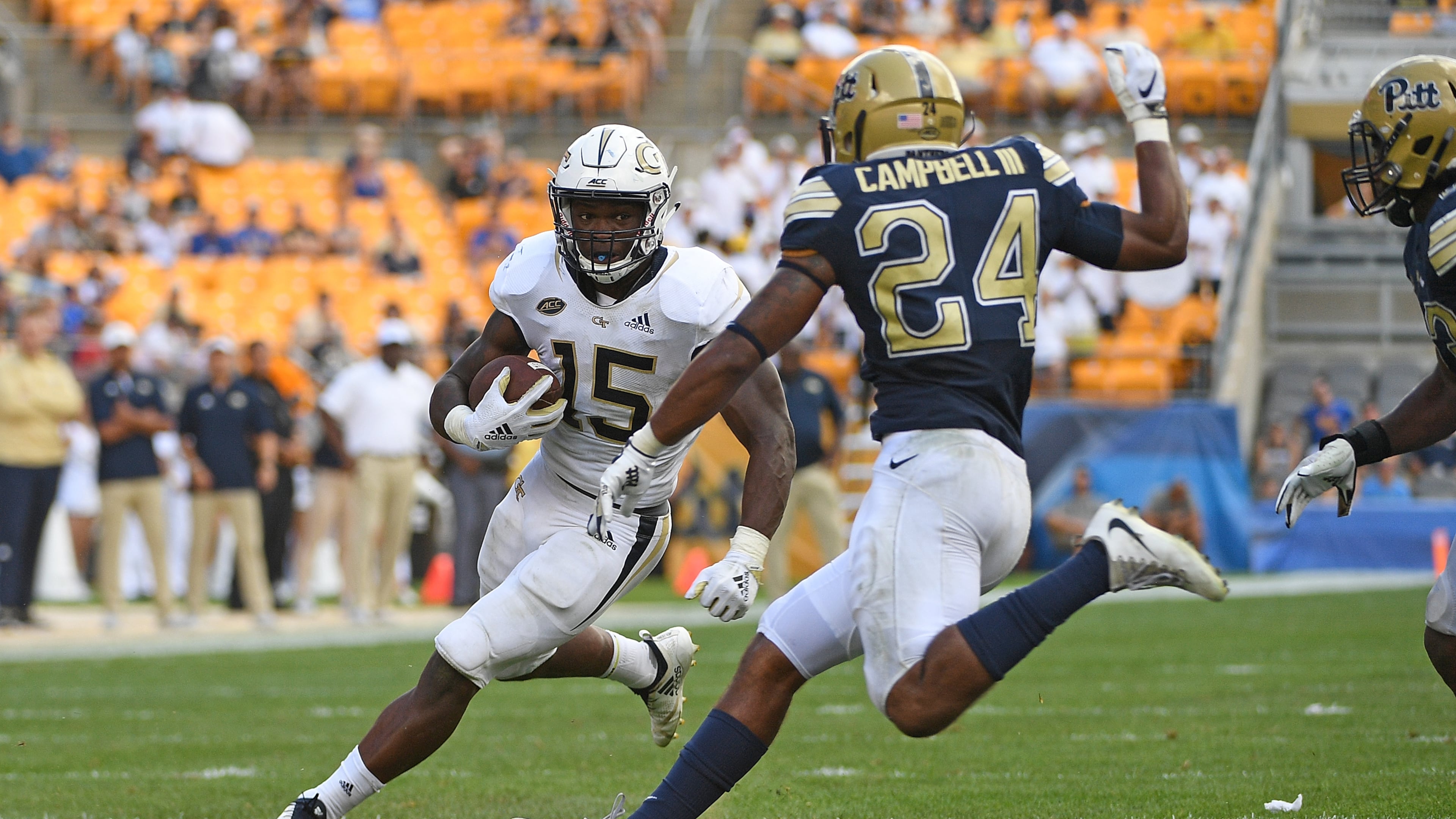 PITTSBURGH, PA - SEPTEMBER 15: Jerry Howard #15 of the Georgia Tech Yellow Jackets runs the ball against Phil Campbell III #24 of the Pittsburgh Panthers in the second half during the game at Heinz Field on September 15, 2018 in Pittsburgh, Pennsylvania. (Photo by Justin Berl/Getty Images)