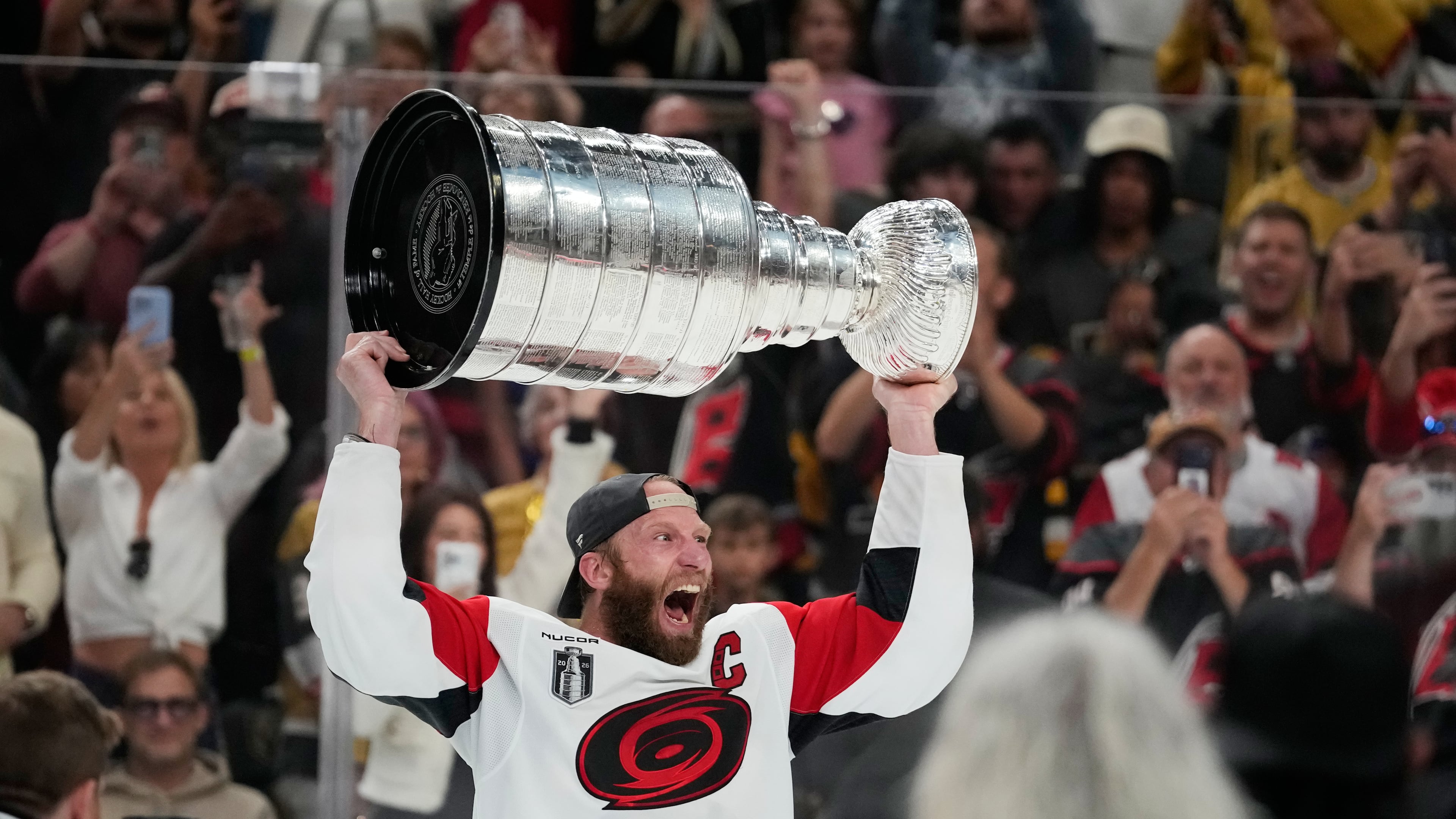 FILE - Carolina Hurricanes center Jordan Staal celebrates after a win over the Vegas Golden Knights in Game 6 of the NHL hockey Stanley Cup Final series June 14, 2026, in Las Vegas. (AP Photo/John Locher, File)